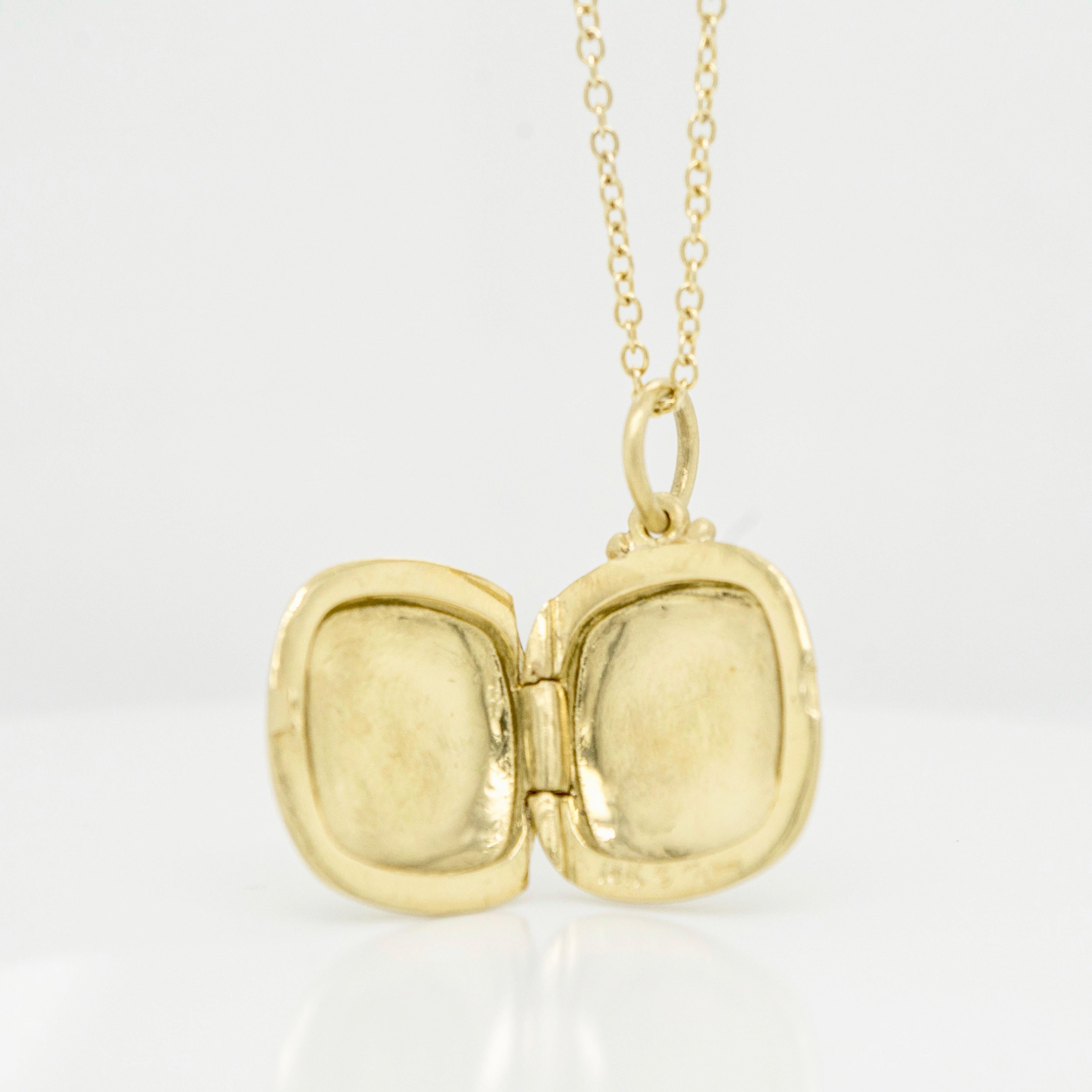 Faye Kim's 18k gold cushion-shaped locket with substance and style. Finely handcrafted and matte-finished. Personalize it with an engraving or with gemstones, and wear it alone or layered with other necklaces. 

Locket .79