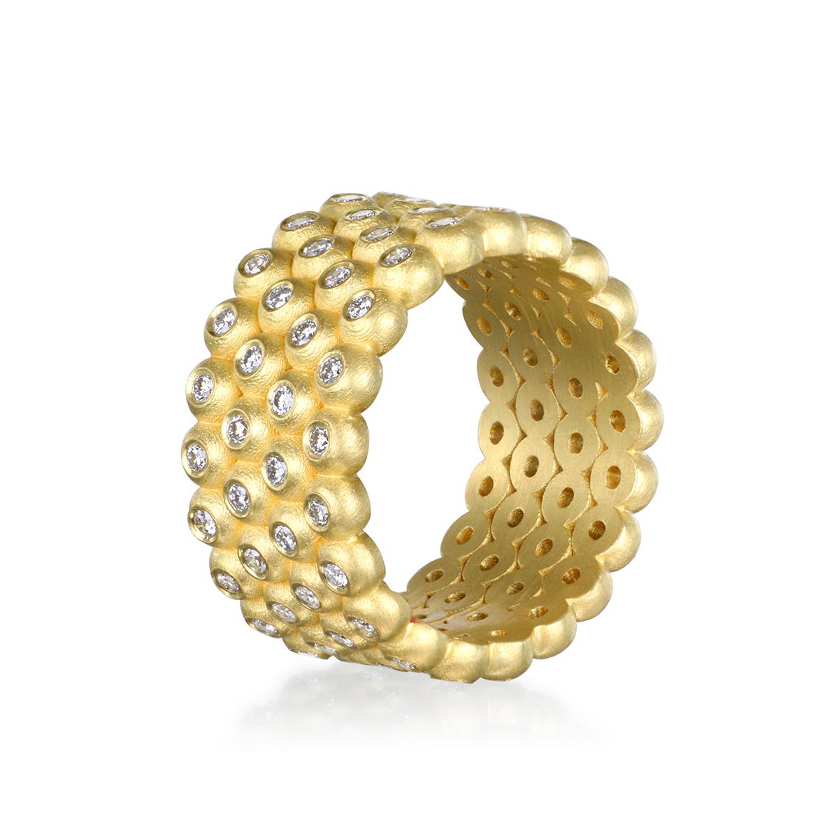 Meticulously crafted in 18k gold, Faye Kim's version of the iconic cigar band is a true work of art. Four rows of brilliant-cut diamonds are burnished to create a dazzling statement ring.

Diamonds 1.04 Carats twt
G color, VS quality     
Width 10mm