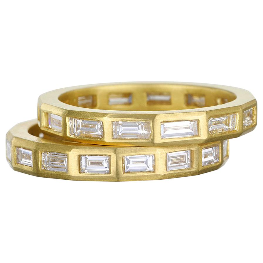 A clean, fresh, and modern take on the diamond eternity band, Faye Kim's 18 karat gold diamond baguette band ring is perfect for stacking with other rings, and allows for many ways to wear and enjoy! 

Diamonds: 1.50 Carats twt
14 Diamonds
Quality: