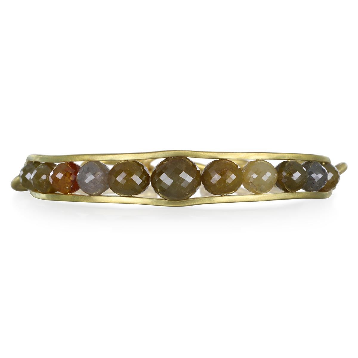 One Of A Kind - Faye Kim's 18 Karat Gold Raw Diamond Bead Cuff / Bangle has both style and substance.  Handcrafted with multicolored raw diamond beads, gently graduated in size.  Finished with gold links for a comfortable fit

Diamonds: Natural