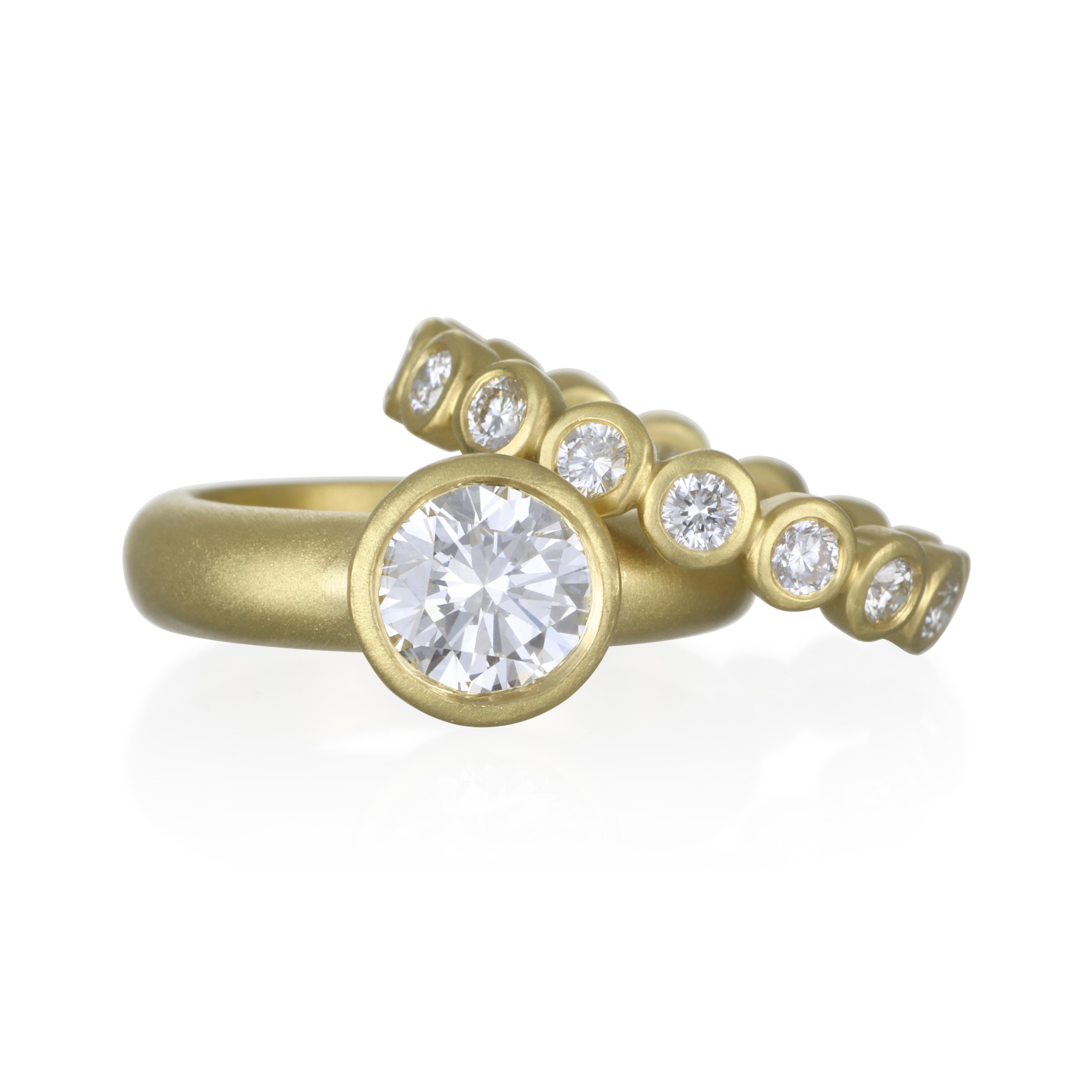 Clean, sleek and contemporary, Faye Kim's 18 karat gold round brilliant cut diamond eternity band is perfect on its own or stacked with others to reflect your own individual style.

Diamonds 1.81 tcw
Size 7.25

Made in the USA