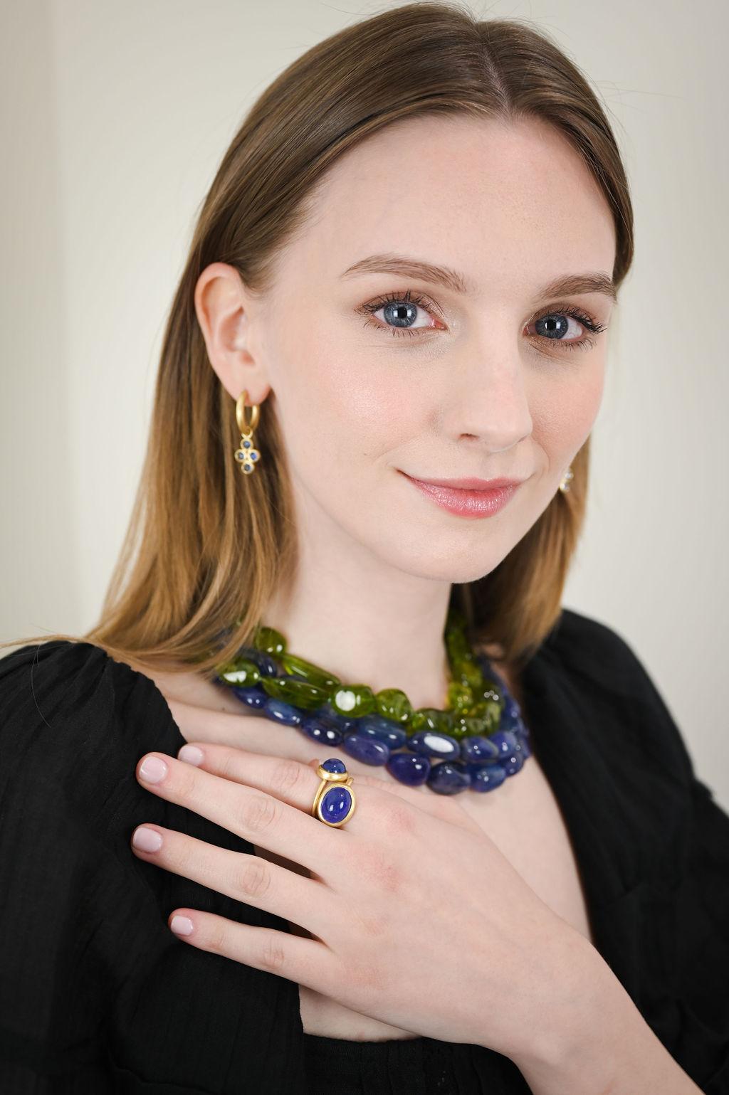 Faye Kim's 18 Karat Gold* Tanzanite Bead Necklace features two strands of beads and a handmade clasp. Tanzanite is said to enable us to move forward with optimism and inspiration, giving us a sense of direction and allowing us to manifest our powers
