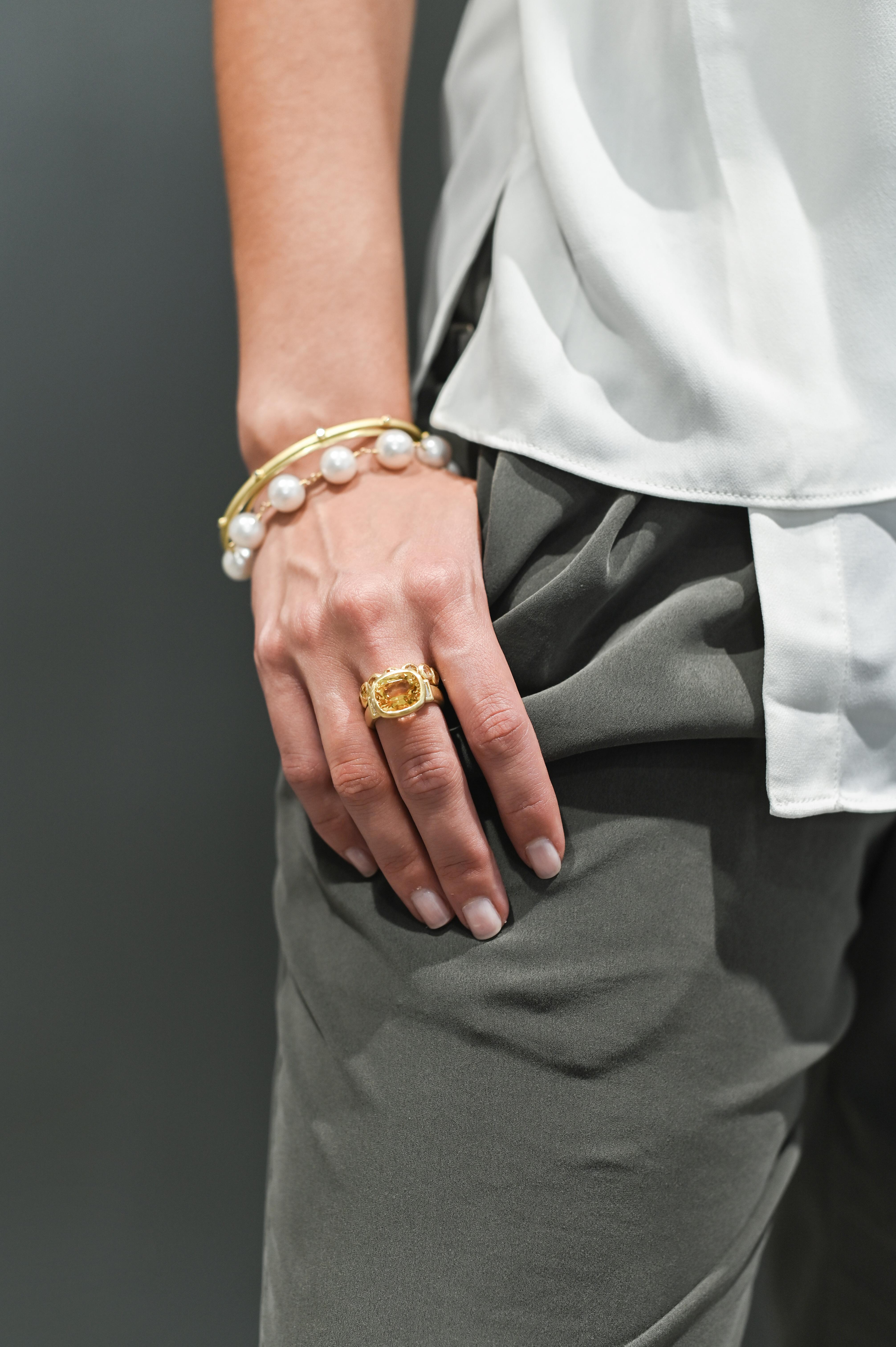 Faye Kim's handwrapped 18K Gold and White Freshwater Cultured Pearl Bracelet ~ A perennial classic and favorite from Faye's signature collection, large white freshwater pearls are chosen for their shape, color, and luster to create a modern-day,
