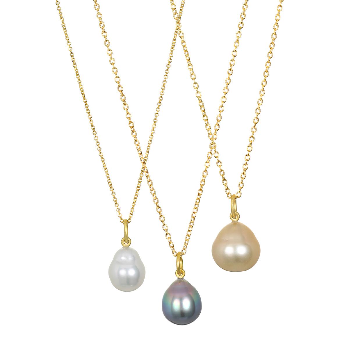 This beautiful Faye Kim Golden South Sea Pearl Pendant, dropped onto an 18 Karat Gold chain with a classic jump ring bail, is both lustrous and classic. The pendant's modern design conveys understated elegance and a truly stylish, everyday look and