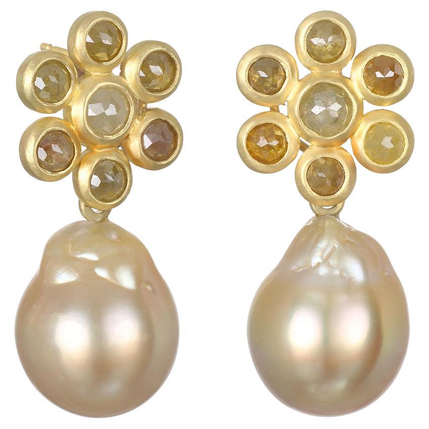 Faye Kim's 18k Gold Golden South Sea Pearl Drops are detachable, allowing them to be worn with Faye's 18k Gold Diamond Daisy Earrings with shepherd's hooks, sold separately. Each pair of pearl drops is unique with slight variations in color and