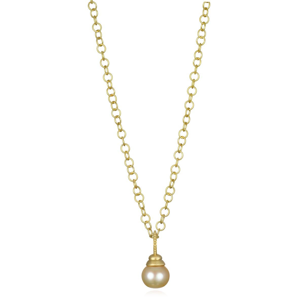 This beautiful Faye Kim Golden South Sea Pearl Pendant is both lustrous and classic. The pendant's modern design, with its double cap and granulation bail, conveys understated elegance and a truly stylish, everyday look and is perfect for layering