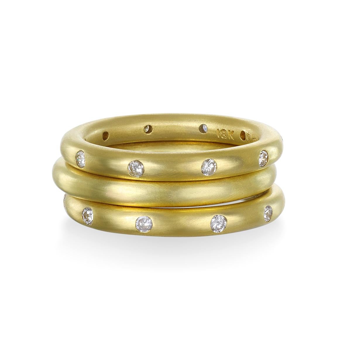The bright white burnished diamonds in Faye Kim's 18 karat gold band ring shines brightly and is a perennial favorite from her signature collection. Endless possibilities to wear, stack, and enjoy!

Sizes: 6 and 7.5 available; can be resized
Width: