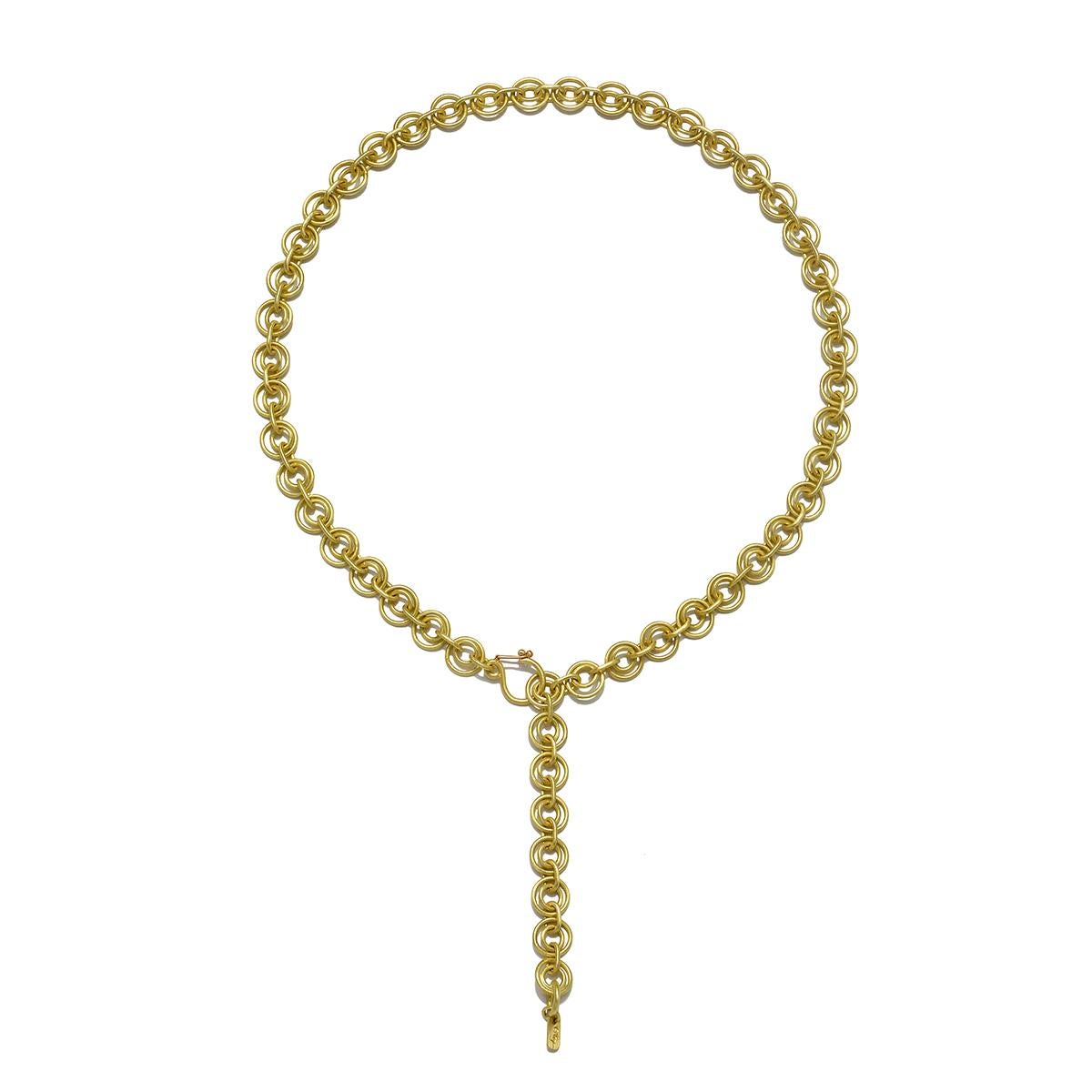 Faye Kim 18k Gold Handmade Double Loop Chain, in her signature green gold matte finish, is a striking statement piece that can be worn on its own, together suspending a pendant, or layered with other pieces from your collection.

Total length: