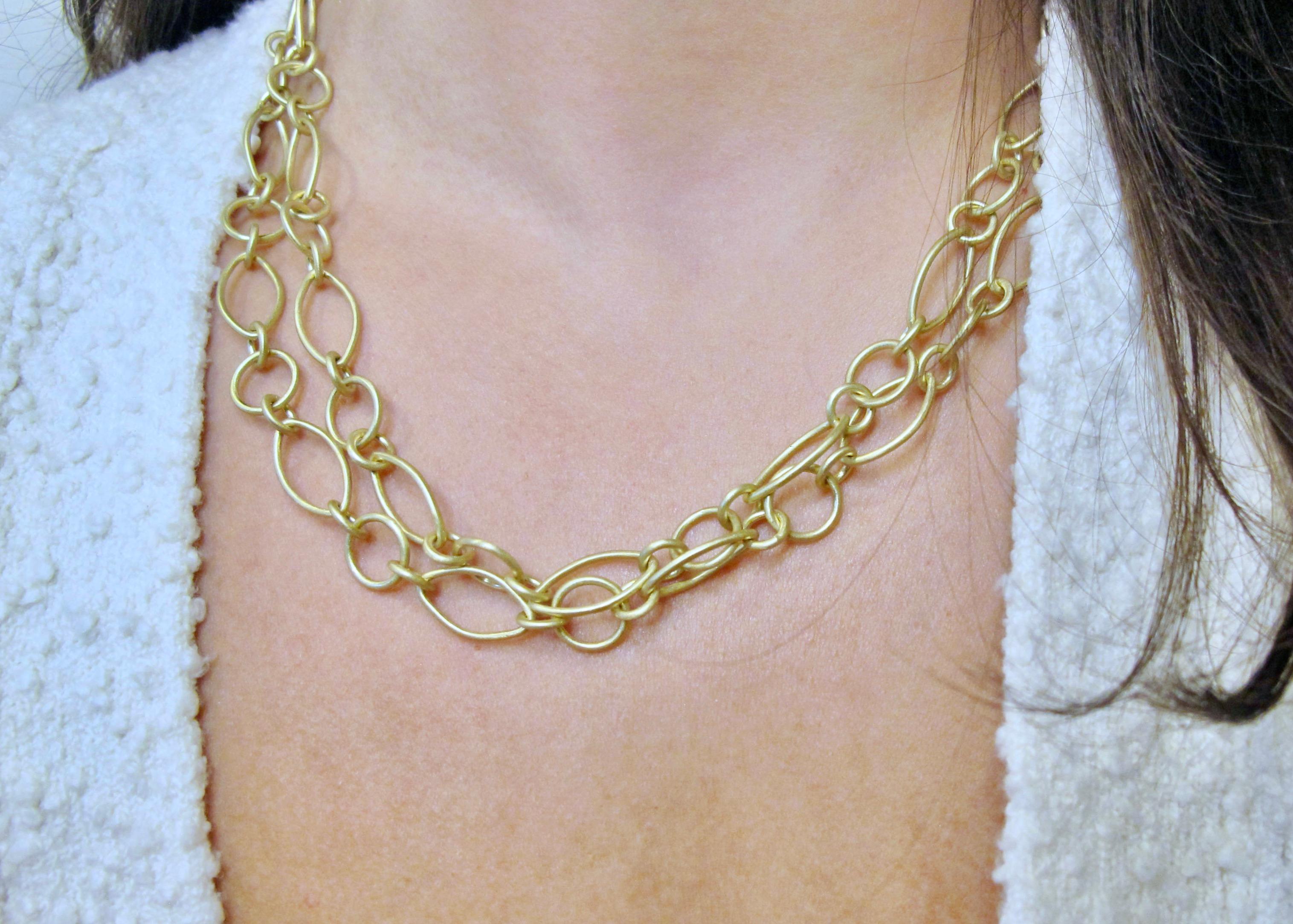 Faye Kim's 18 Karat Handmade Marquise Link Chain is both classic and versatile and can be a staple in every jewelry wardrobe. Alternating mixed shaped matte-finished links give texture and uniqueness to this chain, bringing it to a whole new level.