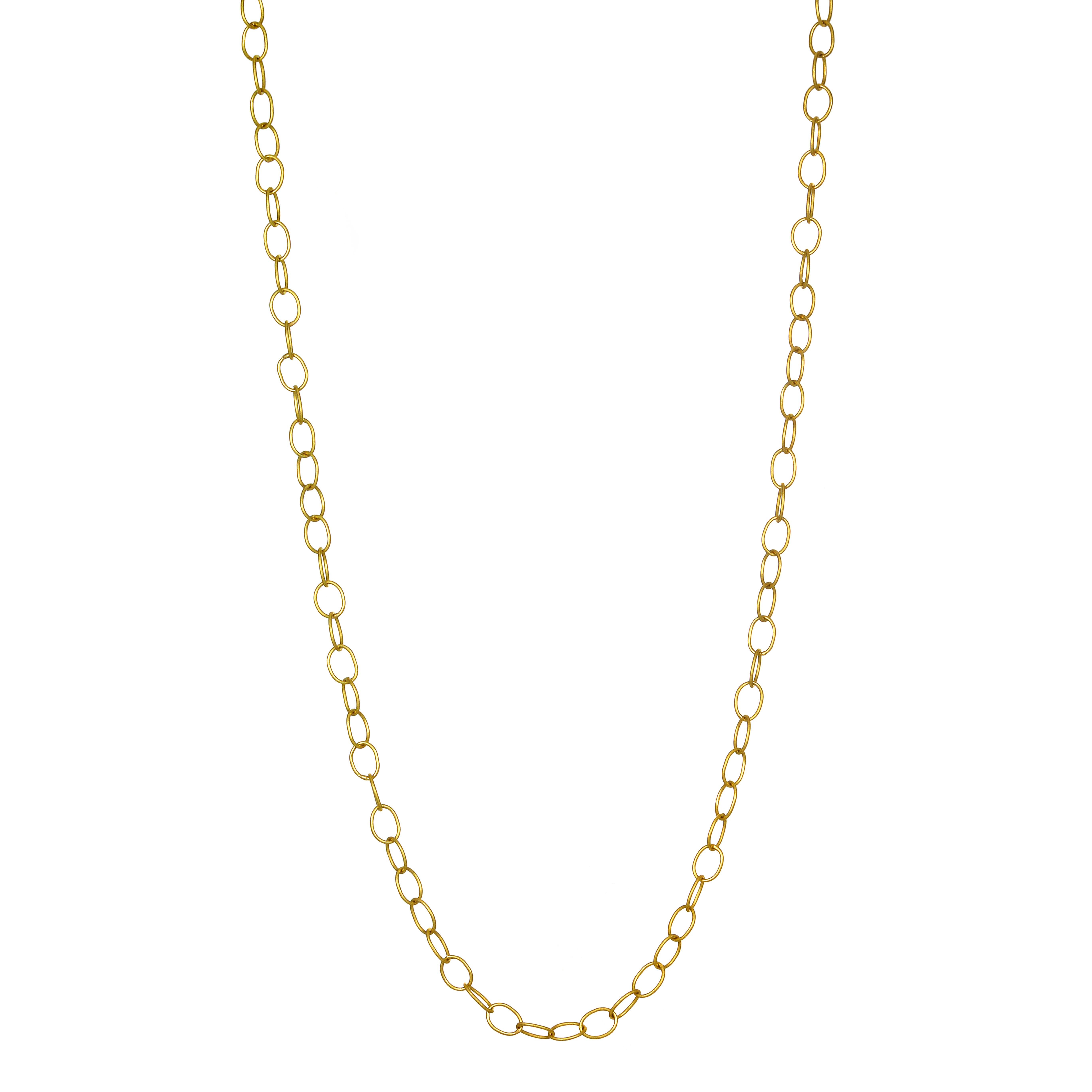 Faye Kim 18 Karat Gold Handmade Medium Oval Link Chain

Classic and versatile, Faye's 18k gold handmade medium oval link chain is a must in every jewelry wardrobe. It elevates the traditional cable link chain to a new level. 3MM in width, it's great