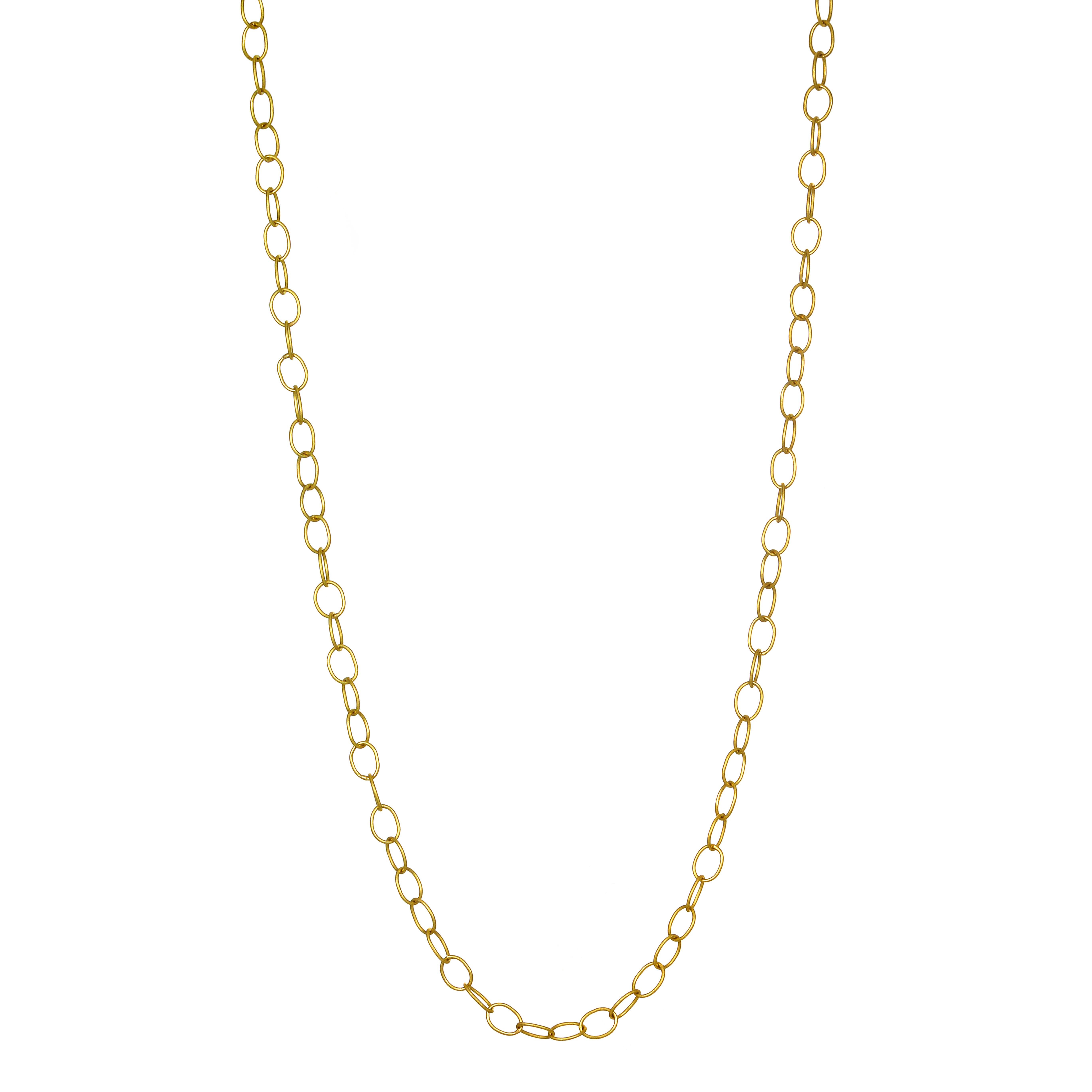 Faye Kim 18 Karat Gold Handmade Medium Oval Link Chain

Classic and versatile, Faye's 18k gold handmade medium oval link chain is a must in every jewelry wardrobe. It brings the traditional cable link chain to a new level. 4mm in width, it's great
