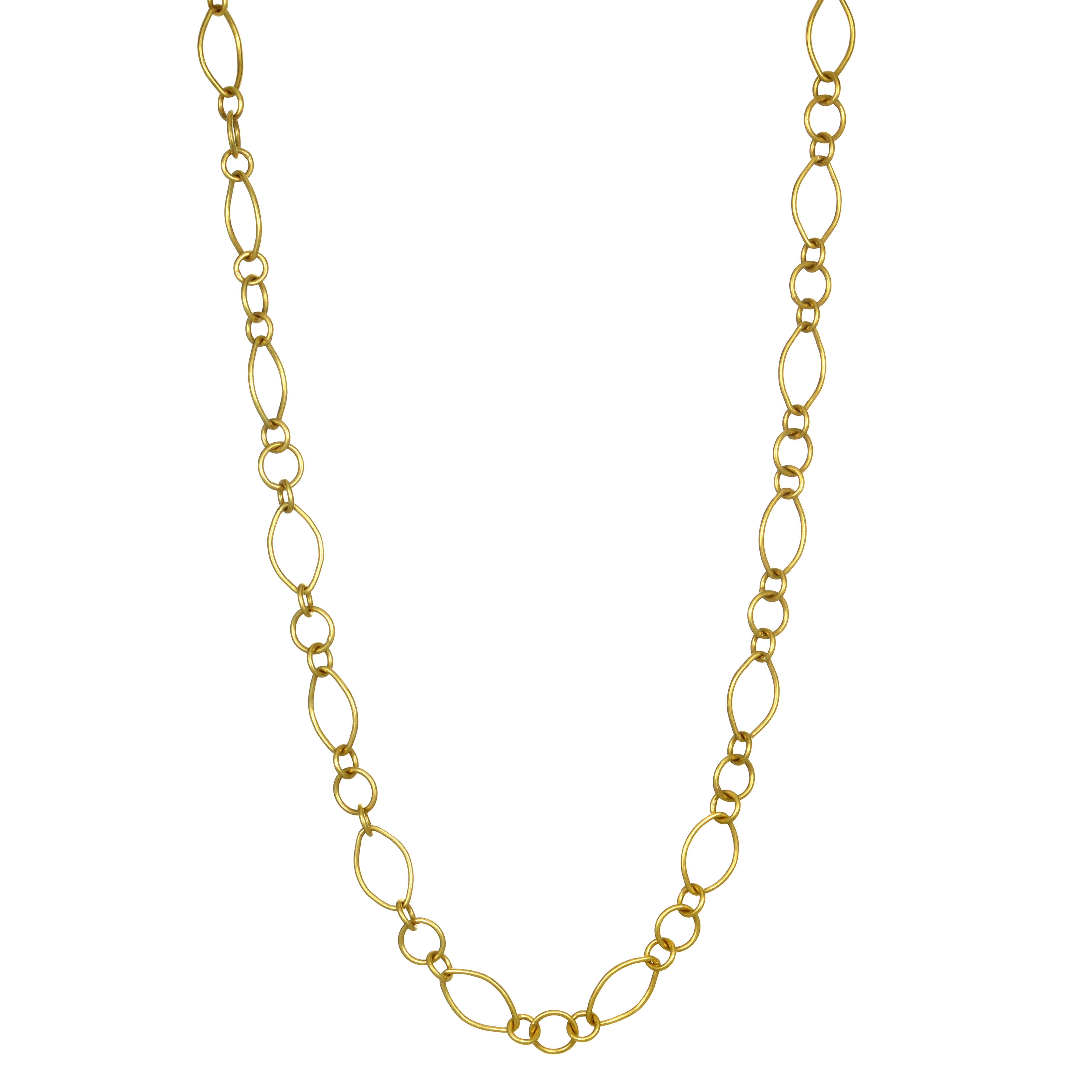 Faye Kim 18 Karat Handmade Mini Marquise Link Chain. Classic and versatile, this 18 karat gold handmade marquise link chain is a must have in every jewelry wardrobe. Alternating mixed shaped links give texture and uniqueness to this chain, bringing