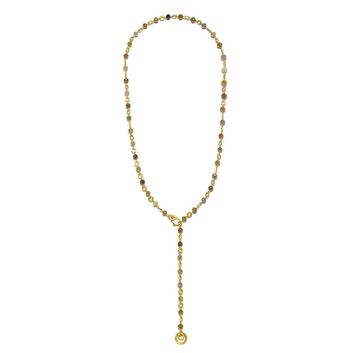 Rich in color, texture, and substance, this Faye Kim 18 Karat Gold Milky Diamond Necklace comprises milky diamond beads that are hand-wrapped in 18 karat gold with 18 karat gold links. Certain to be a conversation starter, this piece, with just the