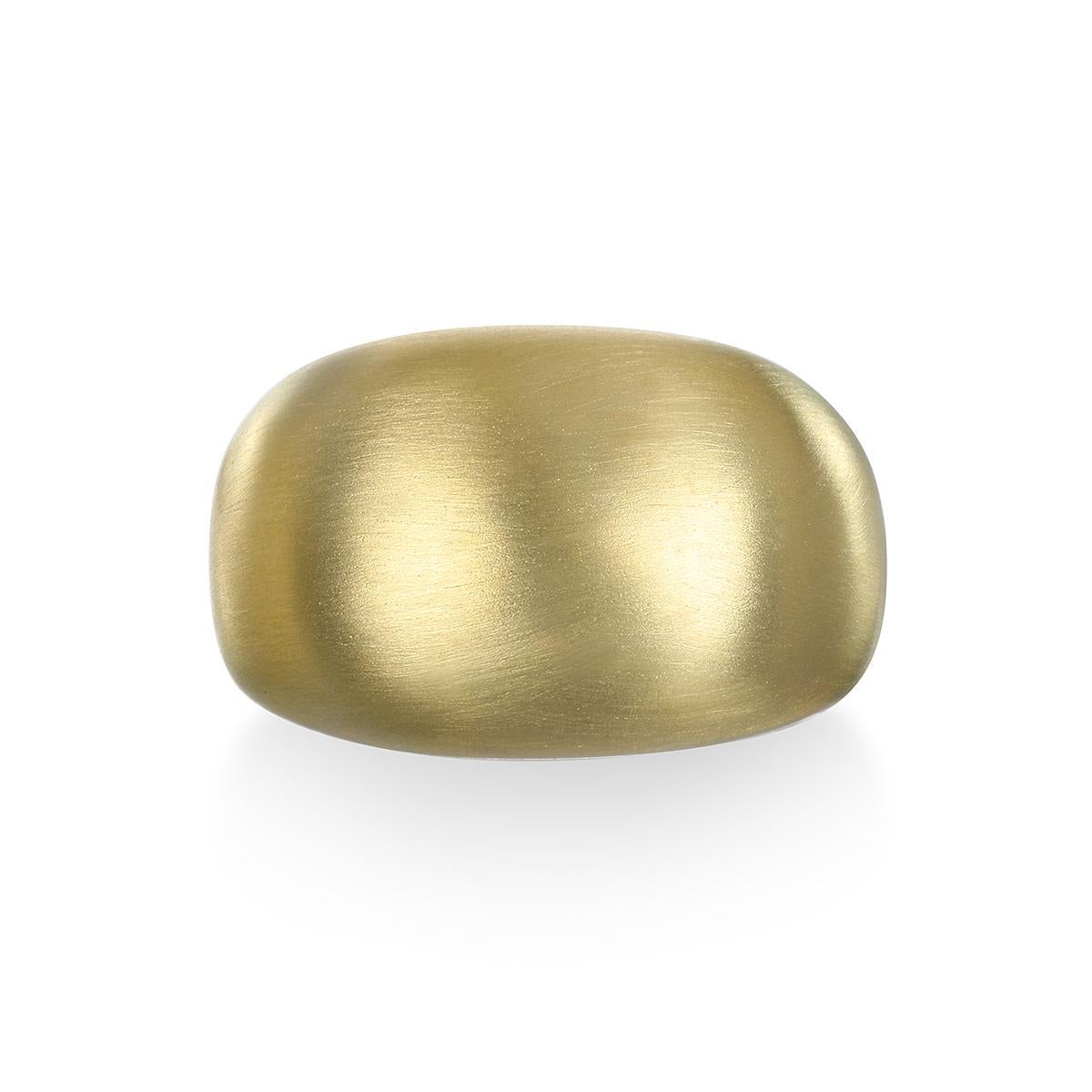 Faye Kim's 18 Karat Gold High Dome Ring, with its clean, understated design and smooth, polished finish, features an eye-catching 8.8mm-high dome. This special piece can be incorporated into virtually any wardrobe, from casual to formal, and is sure