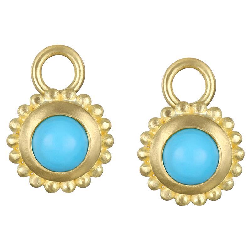 Faye Kim's 18 Karat Gold Hinged Huggy Hoops are matte finished with removable Turquoise Granulation Bezel Drops. These earrings would be a versatile and stylish addition to your jewelry collection.

Bezel dimension 7.5mm
Turquoise stone 4mm
Length