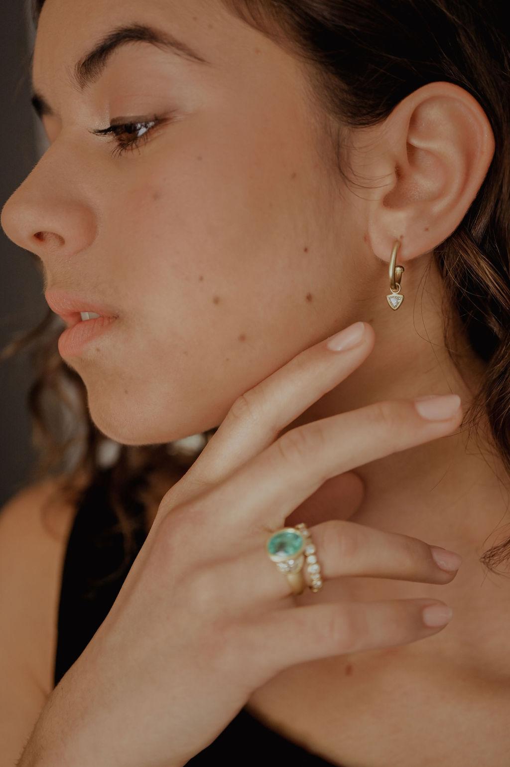 Faye Kim's must-have 18k gold hoops on posts.  A classic look, timeless in design.  Shown here with our Trillion diamond drops to add extra sparkle.  Stylish and great for daily wear.  

The drops are removable and photographed on a variety of Faye