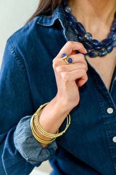 Faye Kim 18 Karat Gold Oval Tanzanite Cabochon Cocktail Ring