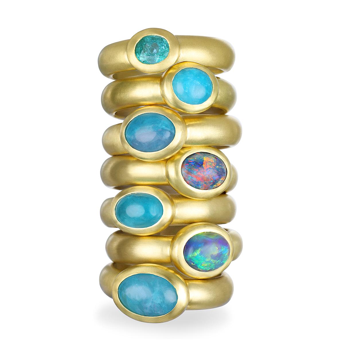 Australian Black Opals are rare gemstones, each with a distinctive personality entirely its own. Here, designer Faye Kim has set this spectacular Black Opal, with its blue-green flash and mined from Lightning Ridge in New South Wales, in 18K gold