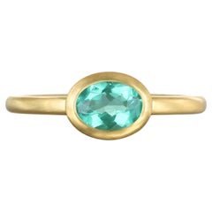 Faye Kim 18 Karat Gold Oval Emerald Single Stone Bezel Ring, Size 7