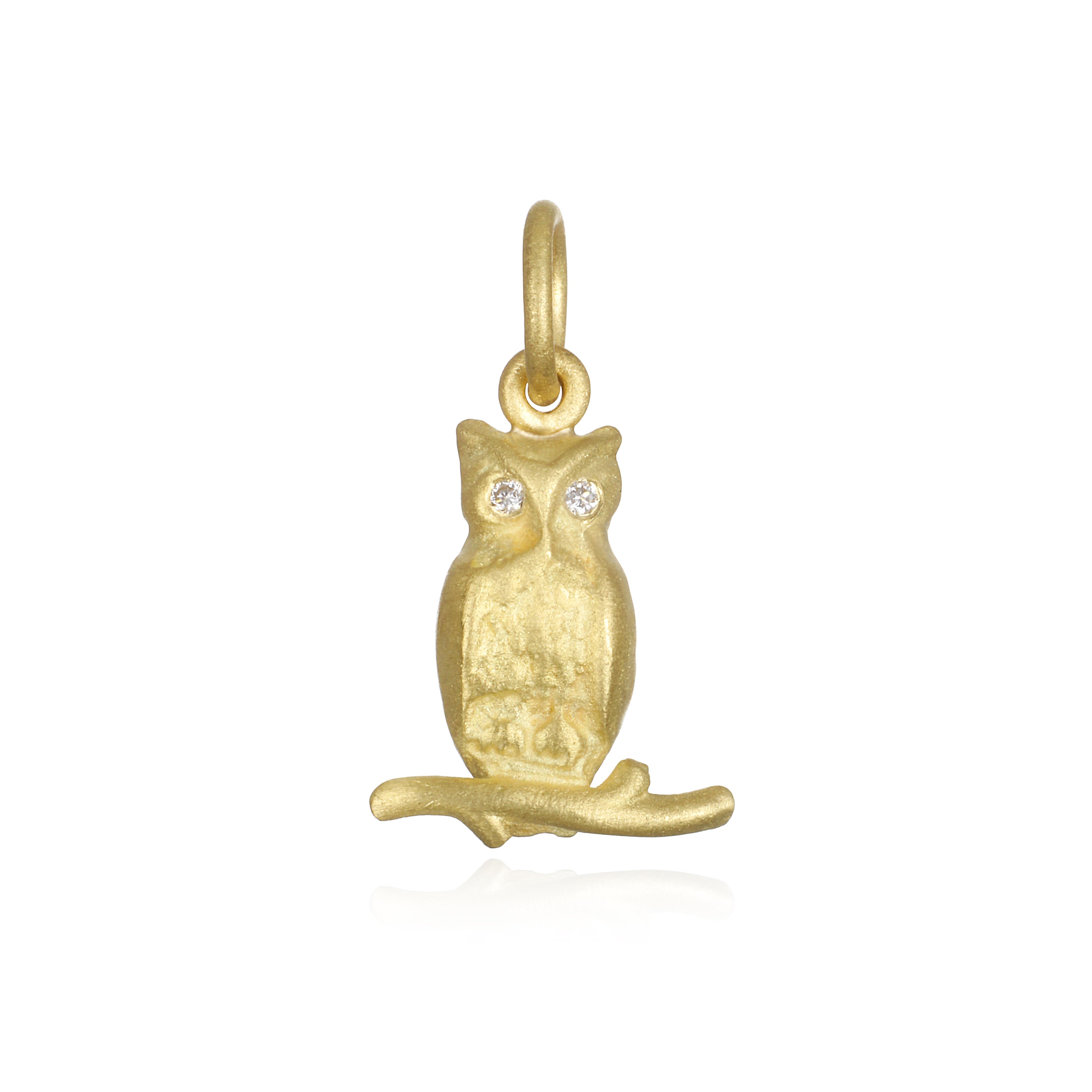 Symbolizing wisdom, truth, and knowledge, Faye Kim's 18k gold Owl with diamond eyes, perched on a branch is beautiful, wise and charming!

Owl Length x Width:  .6
