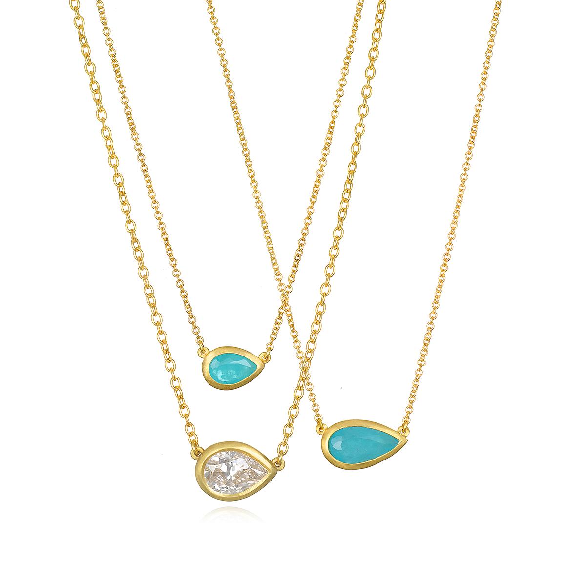 Faye Kim's 18 Karat Gold Paraiba Tourmaline Pear Shape Bezel Necklace is beautiful worn alone or layered with other necklaces. Paraiba Tourmalines, with their vivid, almost electric color, originate in Brazil and are valued for their