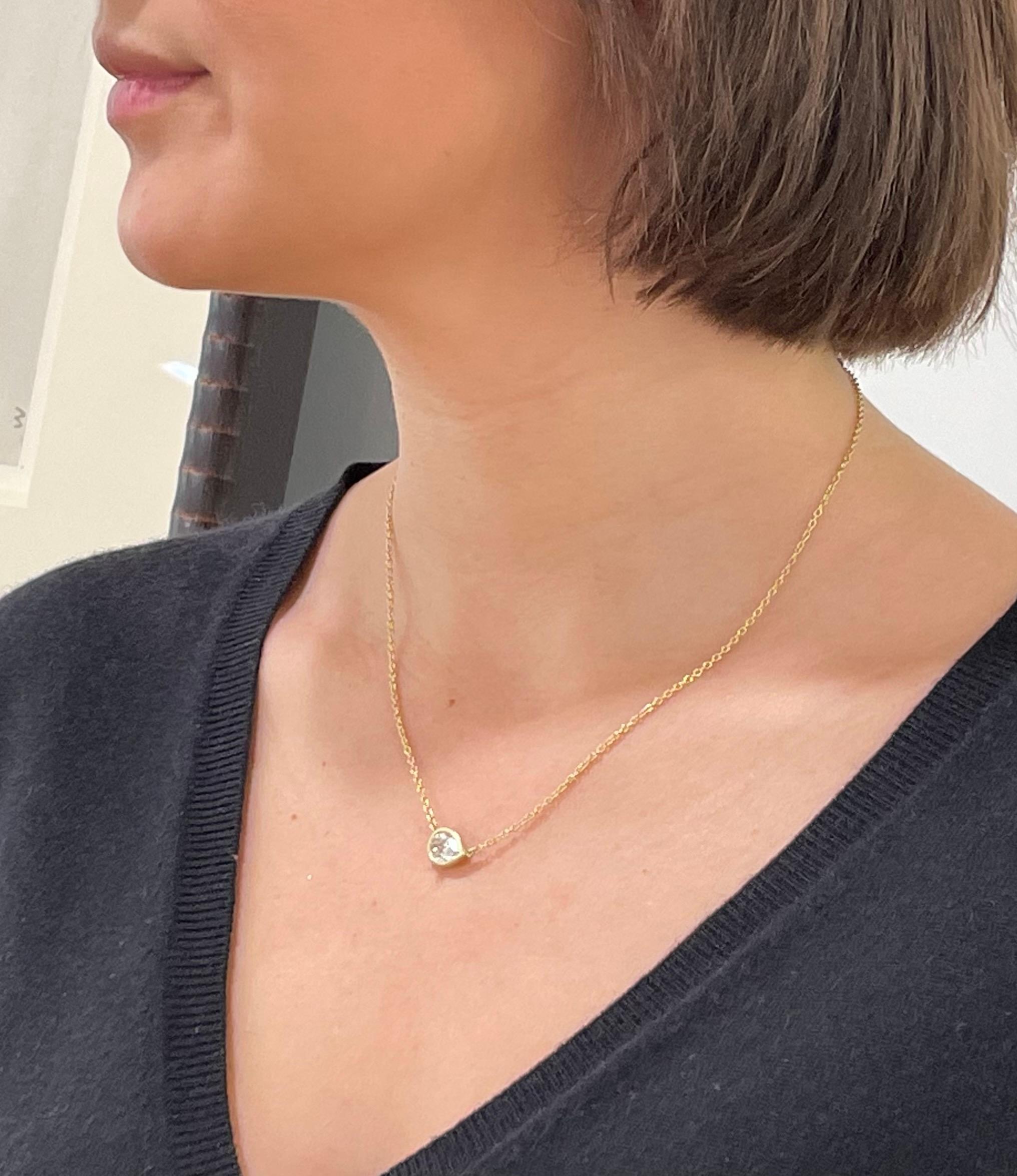 Faye Kim's beautifully handcrafted 18k Gold Pear Shaped Diamond Necklace is designed to be worn alone or stacked with other necklaces. This stunning piece will add just the right amount of sparkle to any outfit and is perfect for every
