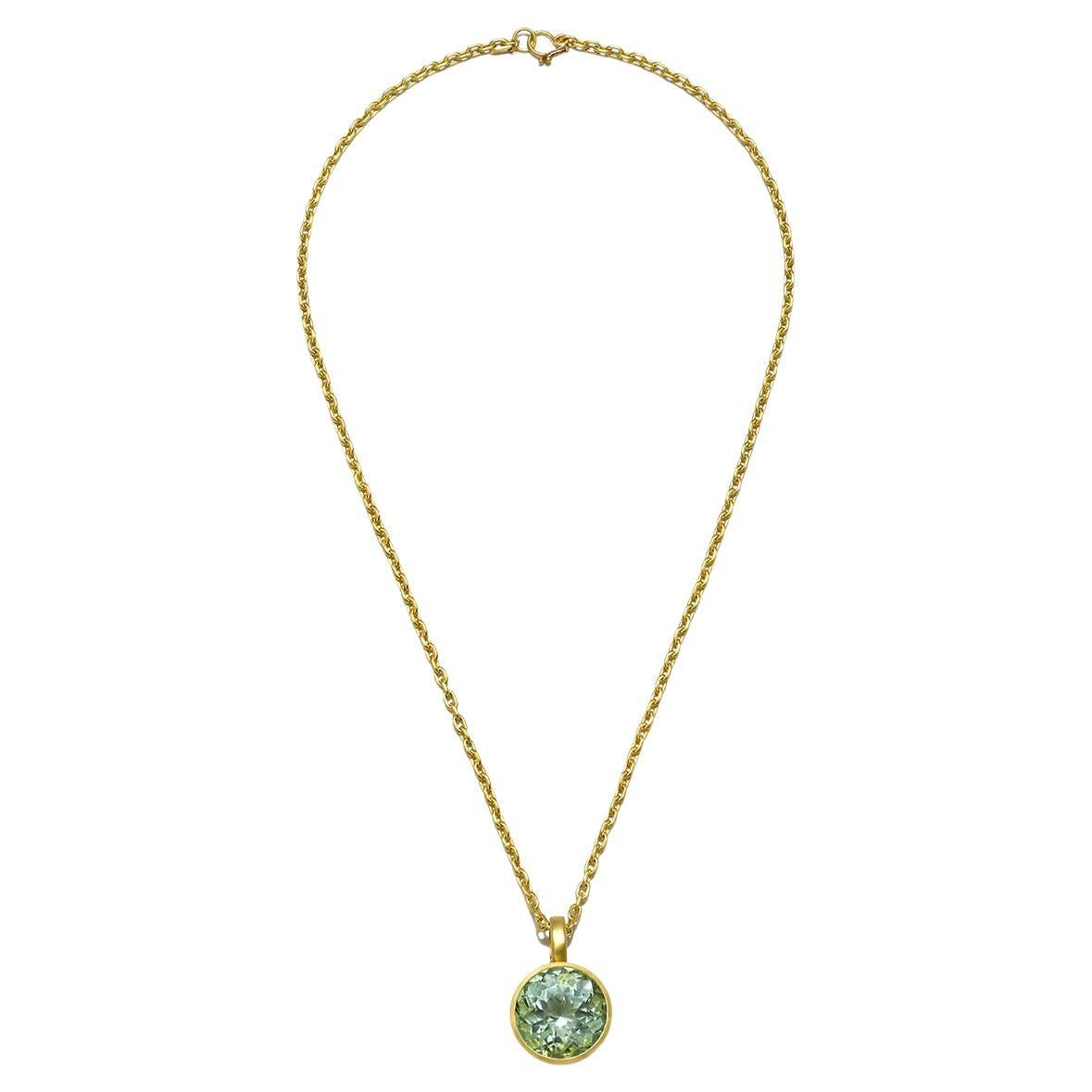 Faye Kim's spectacular 18k Gold Portuguese Cut Green Beryl Pendant, with its unique faceting pattern, mesmerizing blue-green color and open bezel, can be paired with many of Faye Kim's signature and custom chains.

Beryl 44 cts

Pictured on an 18k