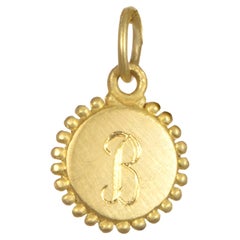 Faye Kim, petite breloque Alphabet en or 18 carats