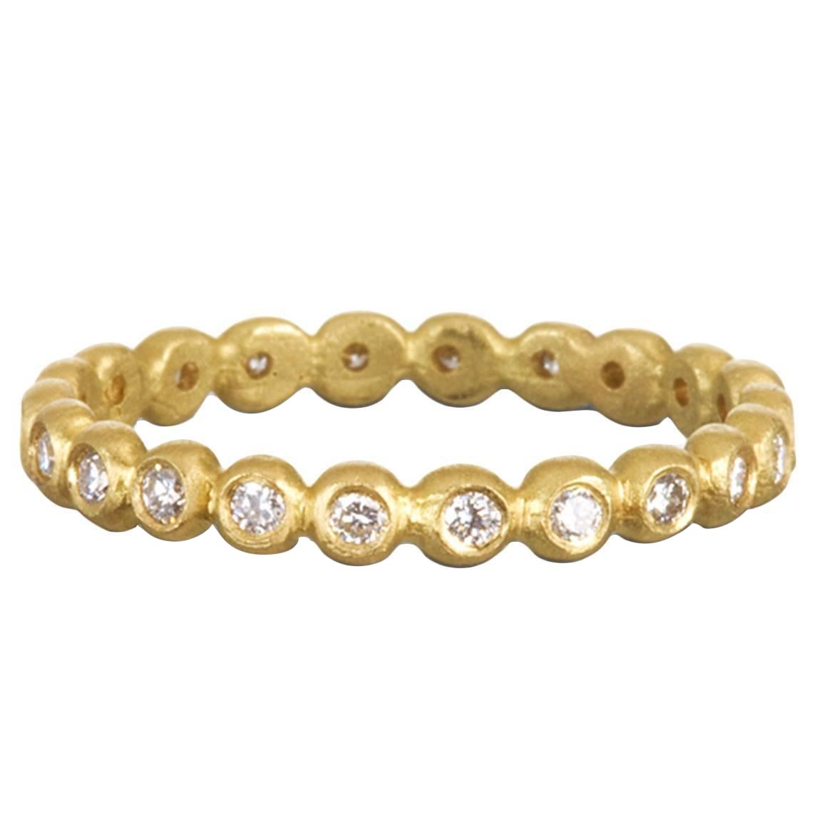 Faye Kim's signature Small Granulation Bead Ring in 18 karat gold offers endless possibilities for stacking or wear on its own for a delicate, clean, contemporary look.  

Width: 3 MM (1/8