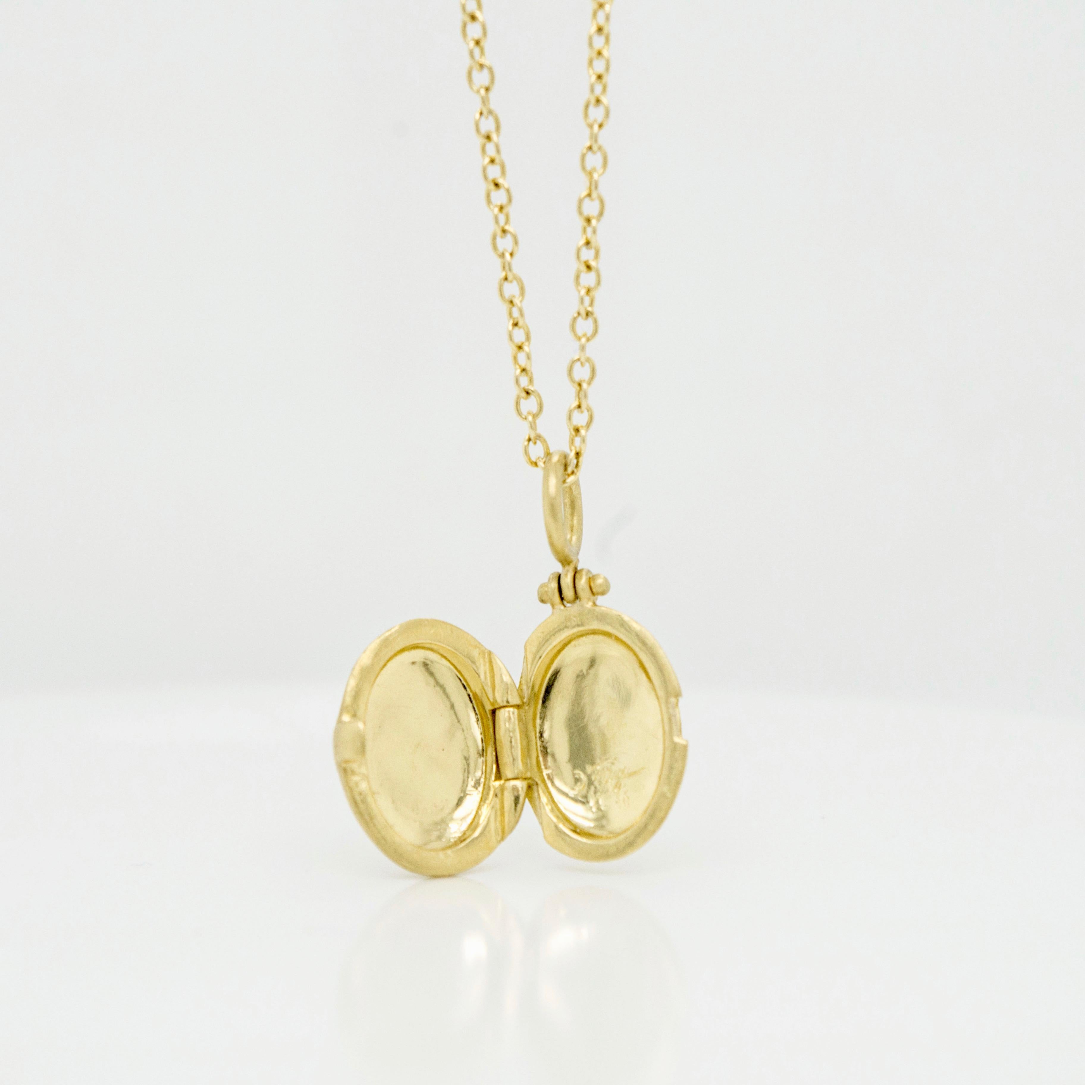 Faye Kim's 18 Karat Gold Small Oval Locket combines substance with style. Finely handcrafted and matte-finished, this locket can be personalized with an engraving or with gemstones, and layered with other necklaces or worn alone.

Locket .72