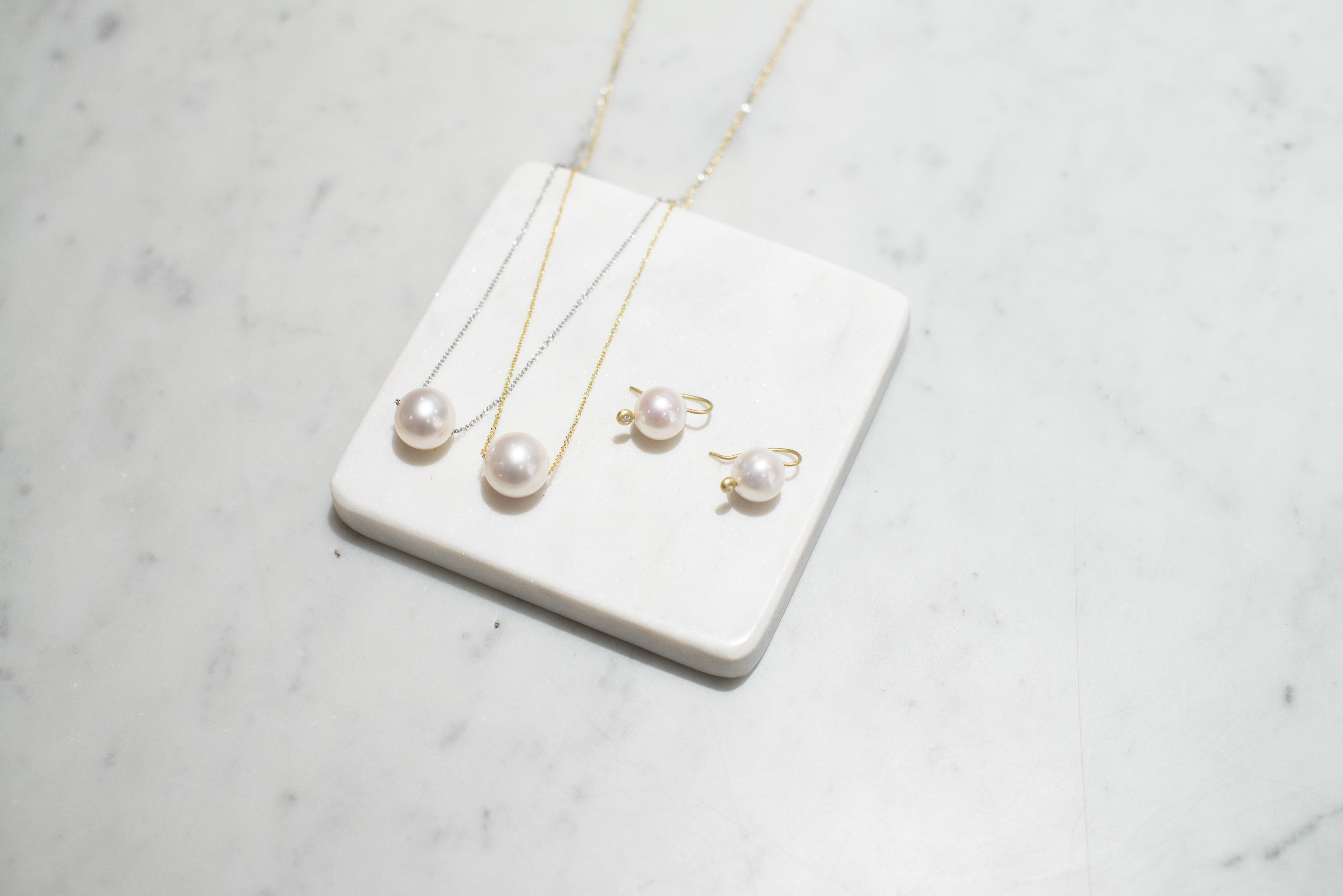 The absolute best go-to earring!  Faye Kim's White Freshwater Pearls on 18 karat gold ear wires feature a bright diamond at the earring base for a pretty pop of sparkle.

Diamonds .10 Carats tcw
White Freshwater Pearl 12-13mm
Length