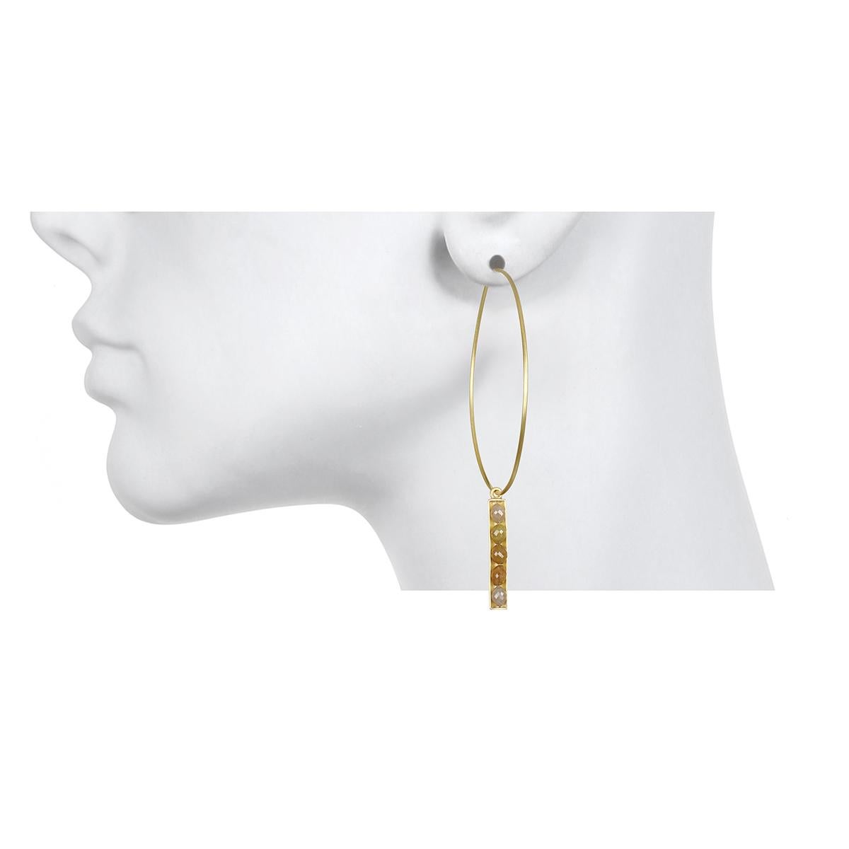 Elegant and chic hoop earrings in 18k gold with diamond bar drops.  The bars are reversible with the sparkle of yellow faceted diamonds on one side and matte gold on the other.  Wear with our favorite wire hoops in a variety of sizes. 
 
Earrings as