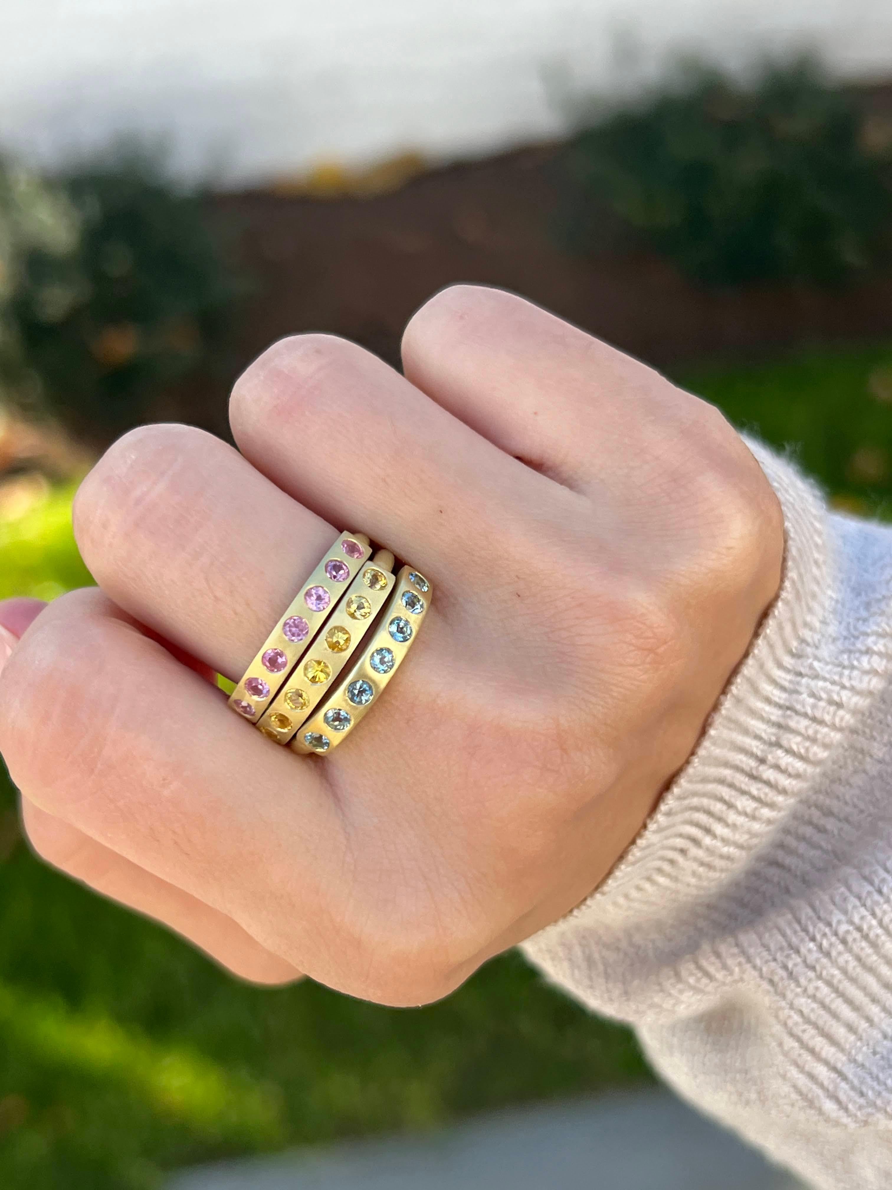 Faye Kim's 18 Karat Gold Yellow Sapphire Handmade Burnished Bar Ring can be worn alone or mixed with other rings to brighten your everyday style and add sparkle to your wardrobe. Perfect for every occasion!

Yellow Sapphires .51 tcw
Bar 3.5mm
Shank