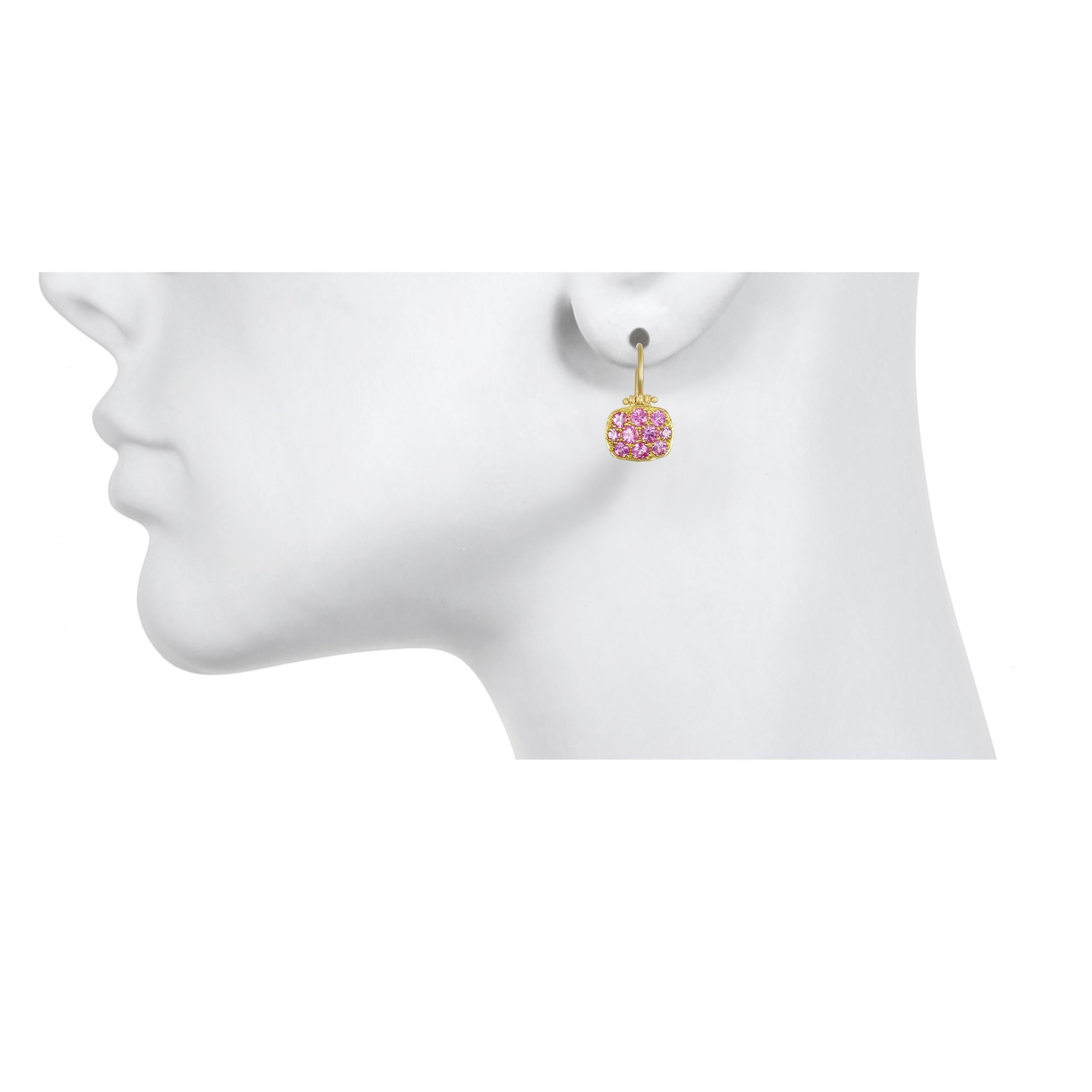 Faye Kim 18 Karat Pink Sapphire Chiclet Earrings 

These bright and happy pink sapphire chiclet earrings have just enough sparkle to get noticed but with understated elegance.  Hinged for movement, uniquely shaped and light-weight make these