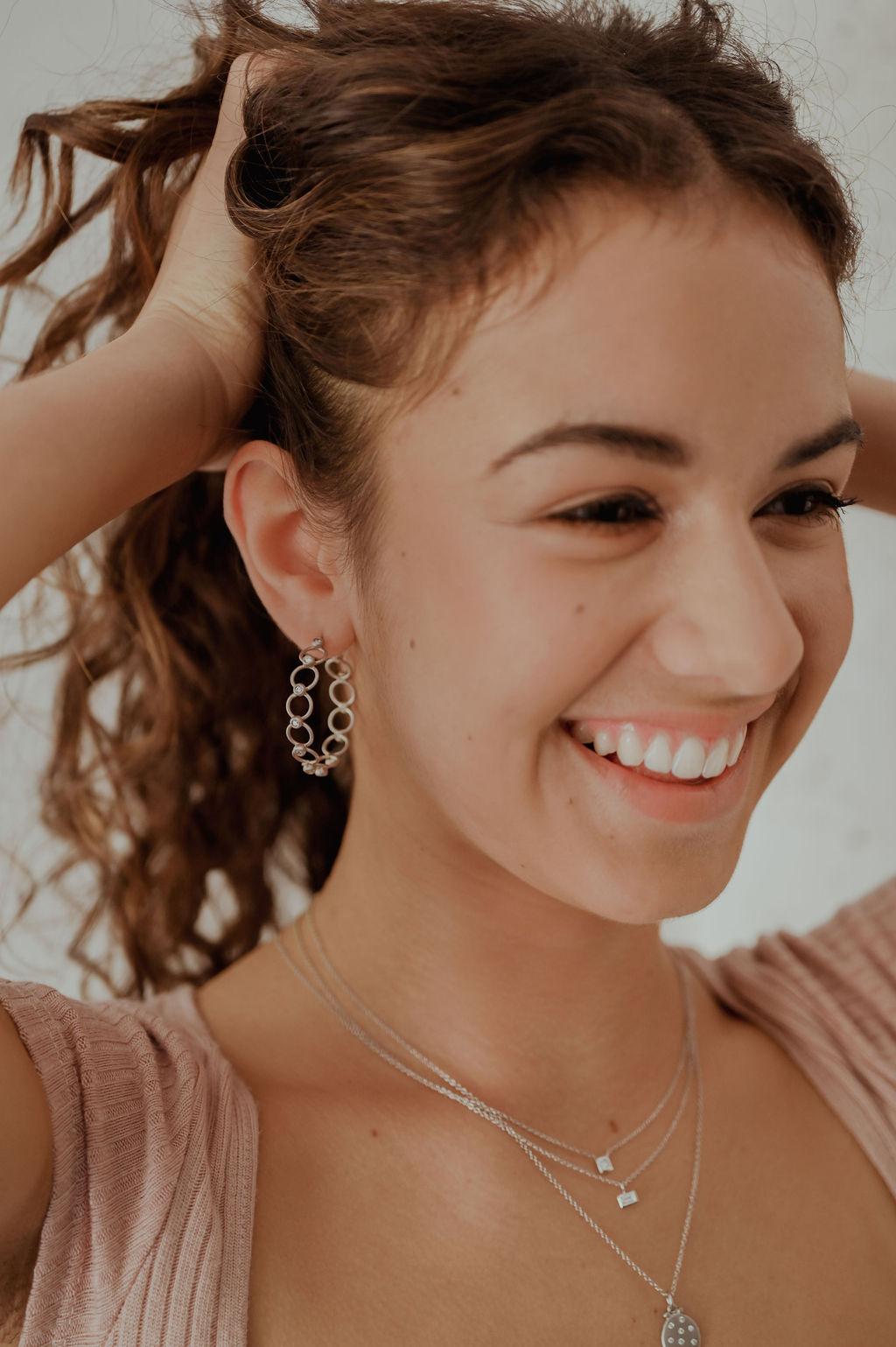 Handcrafted in 18K white gold, Faye Kim’s modern Lace Hoops are complete with a matte finish and diamond accents. A truly bright and stylish look.

Diamonds - .66 Carats twt
F/G, VS Quality
1.25