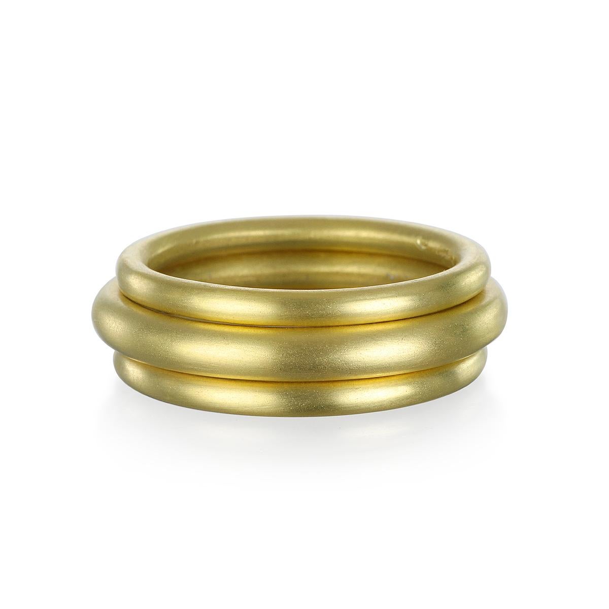 Handmade in 18 Karat Gold with a matte finish, Faye Kim's 3mm round band is classic, versatile, and a perennial favorite. Wear alone or stack to create your own unique style.

Width 3mm 
Size 7.5 (can be resized, please inquire for more info)

Made