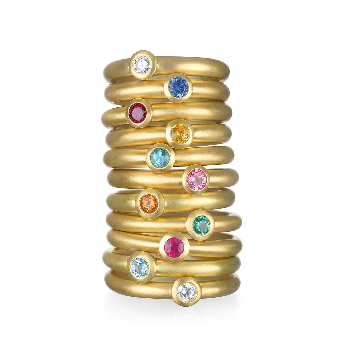 The perfect bright Blue Green African Tourmaline stack ring. Beautifully crafted, bezel set and matte-finished.  Wear alone or stacked with other rings to elevate your individual style!

Handcrafted in 18k green gold, Faye Kim’s modern design