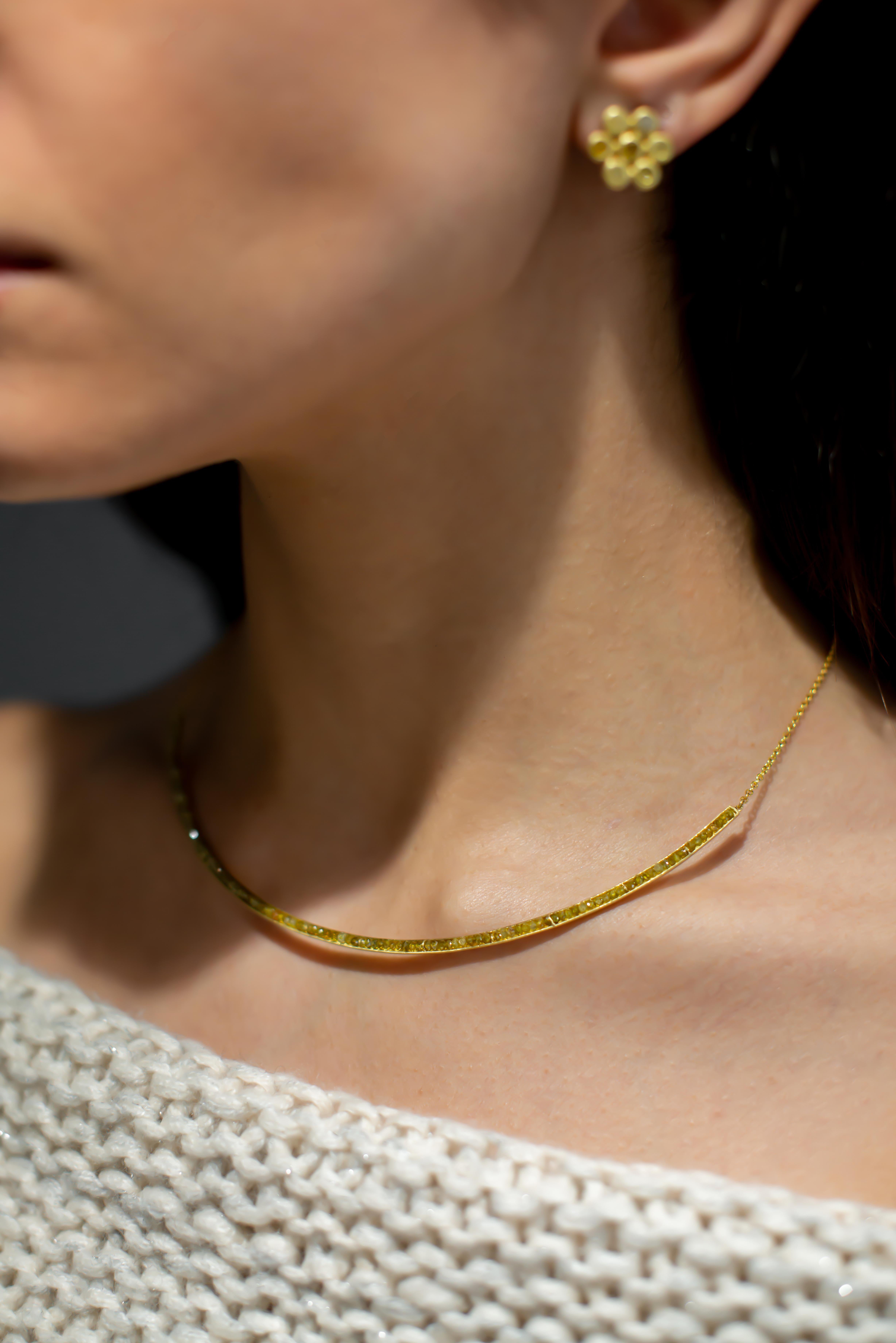 Feminine yet edgy, sleek yellow faceted raw diamonds are expertly channel set in 18k gold.
Gently curved for a flattering fit and finished with a cable link, adjustable chain. 
Matte-finished.
Necklace Length 15-16.5