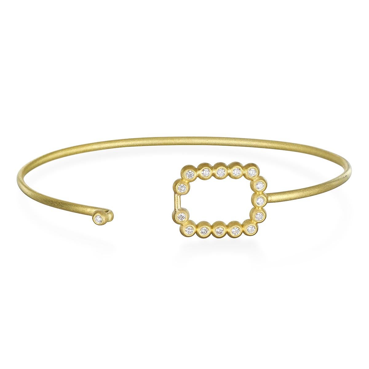 Understated beauty! Faye Kim's handcrafted in 18k gold, the rectangular diamond motif doubles as the clasp. Perfect to wear on its own or great to stack with other bangles.

Bangle Dimensions: LxW 2.5