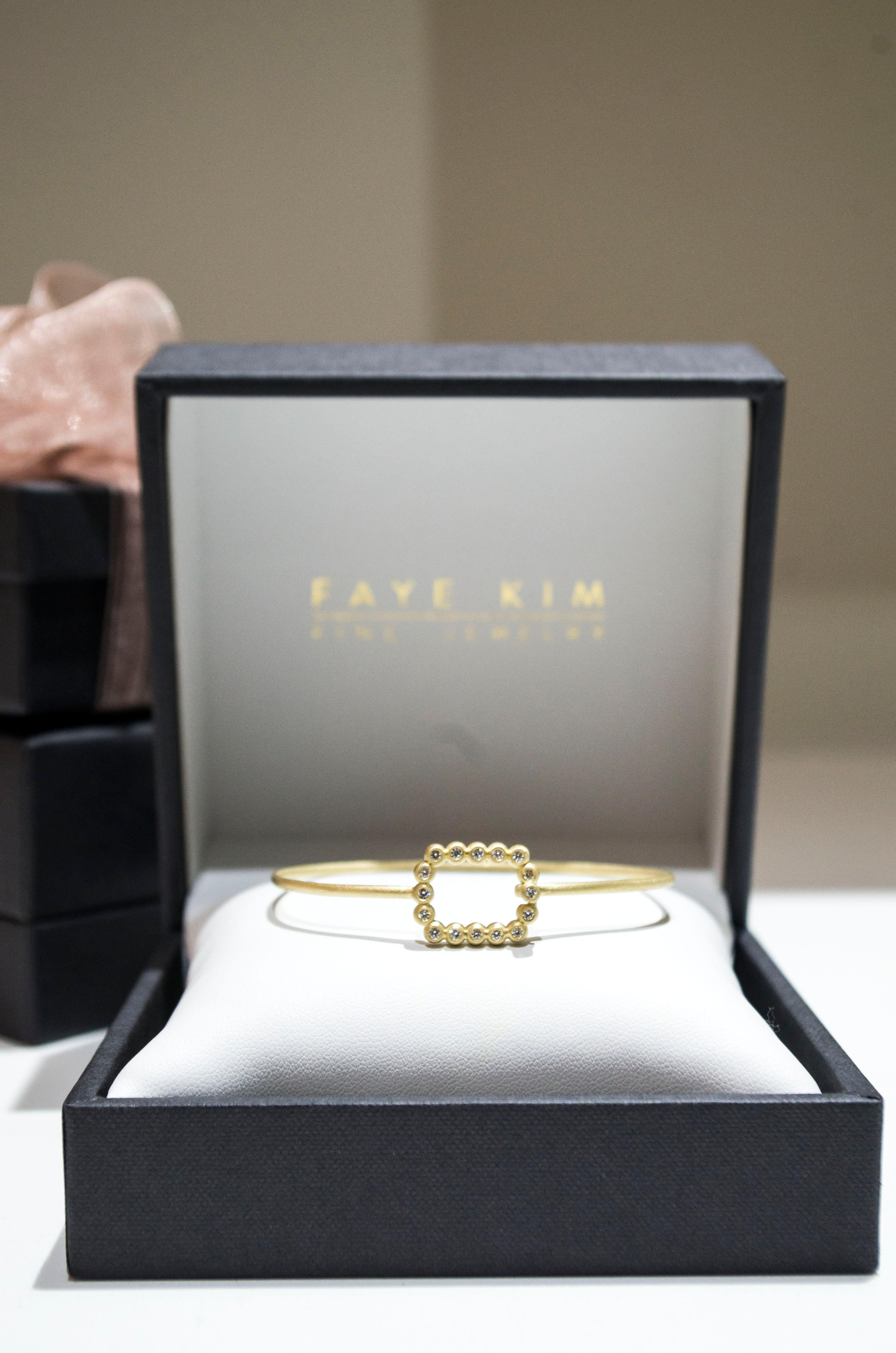 Round Cut Faye Kim 18 Karat Gold Bangle with Cushion Diamond Motif Closure For Sale