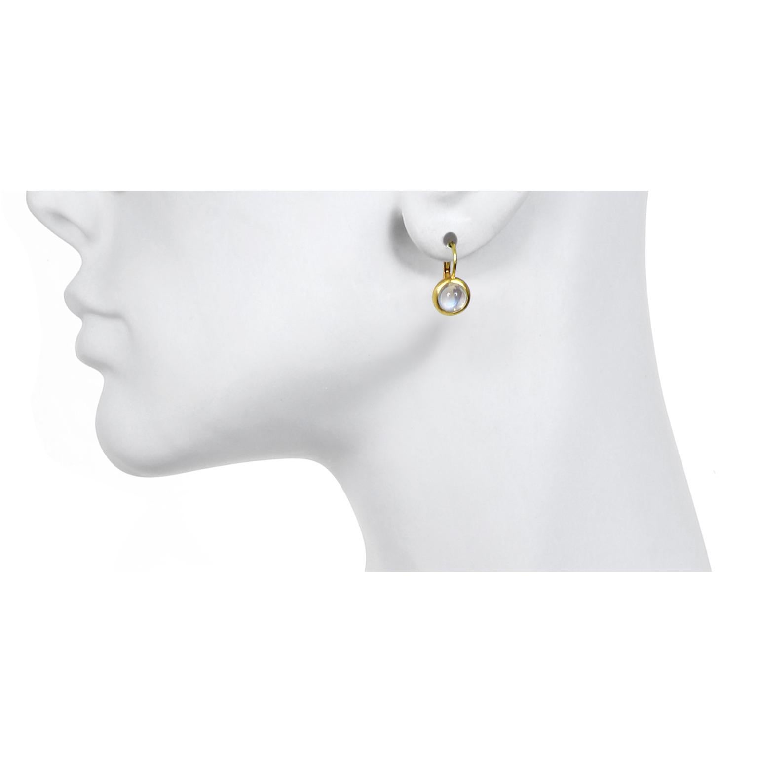 Faye Kim 18K Gold Moonstone Leverback Earrings

The perfect go-to earrings.  Incredible Ceylon moonstone with blue flash set beautifully in a bezel setting.  These understated elegant earrings go effortlessly from day to evening.
Moonstones:  2.60