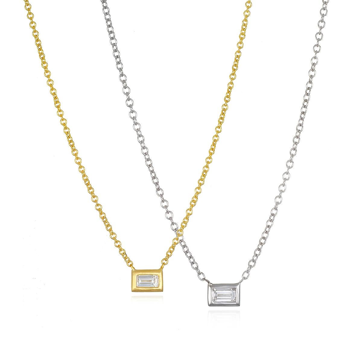 Faye Kim's 18k Green Gold Diamond Baguette Drop Necklace with a bezel setting is a simple, classic design.
Whether your style is traditional or contemporary, it's great as a foundation piece or to layer with larger, longer necklaces.