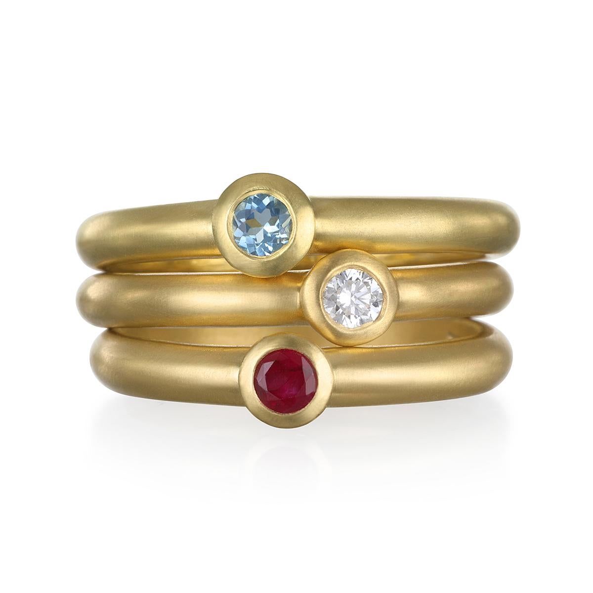 The perfect bright, and simple diamond solitaire stack ring. Beautifully crafted, bezel set and matte-finished.  Wear alone or stacked with other rings to elevate your individual style!

Handcrafted in 18k green gold, Faye Kim’s modern design