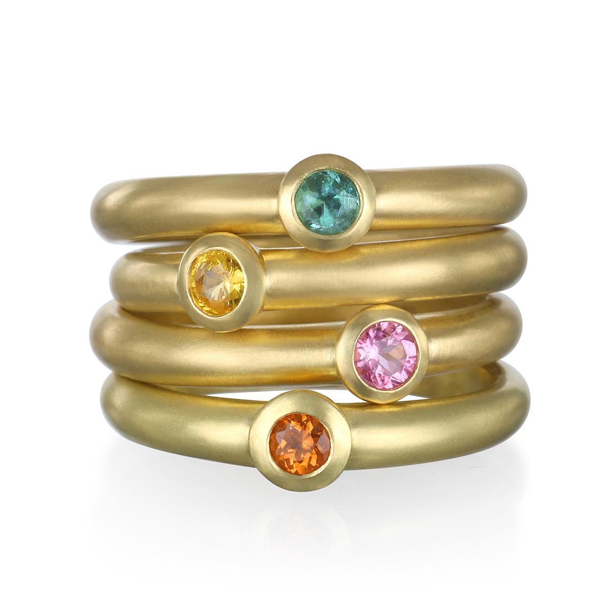 The perfect bright and simple, emerald stack ring. Beautifully crafted, bezel set and matte-finished.  Wear alone or stacked with other rings to elevate your individual style!

Handcrafted in 18k green gold, Faye Kim’s modern design conveys