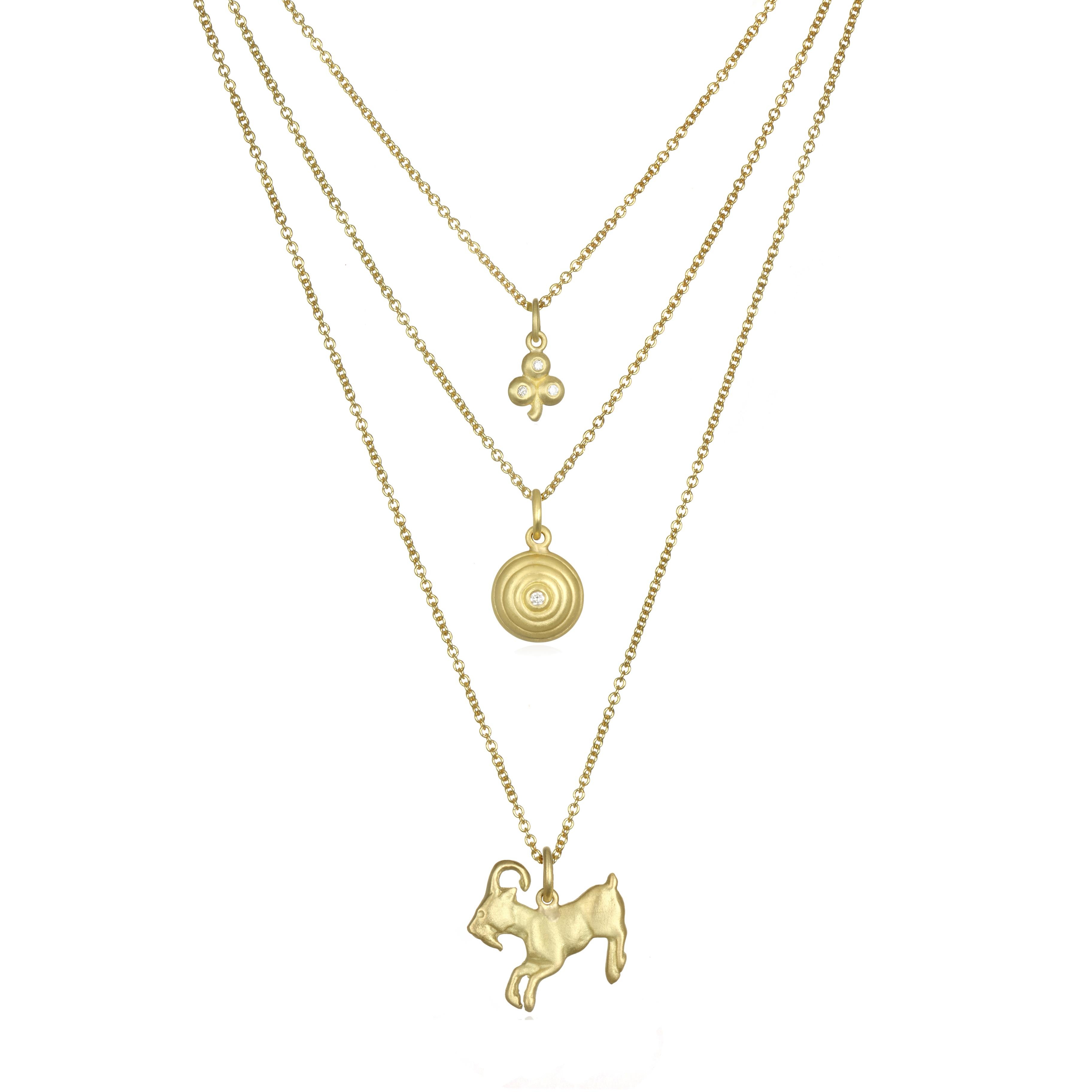 For determination, health and vitality - this Goat charm is crafted in 18K green gold. The cable chain is 16-18