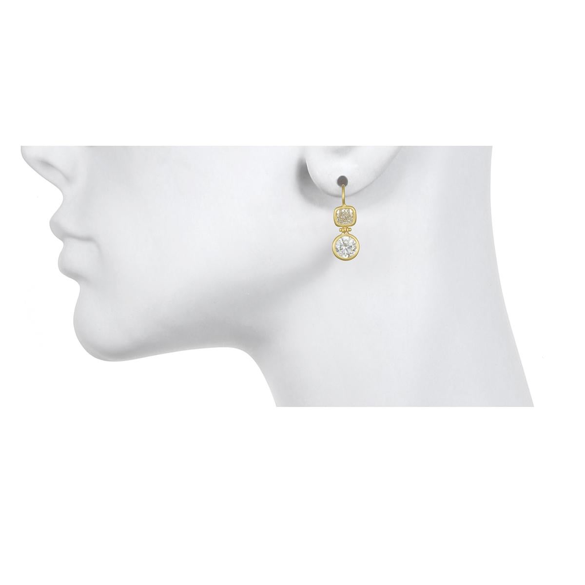 Faye Kim 18k Gold GIA Round and Cushion Shaped Diamond Drop Earrings

An extraordinary pair of diamond earrings from Faye Kim.  Cushion cut diamonds are hinged above round diamonds for a striking contrast.  Bezel set in 18k matte gold.  

Diamonds =