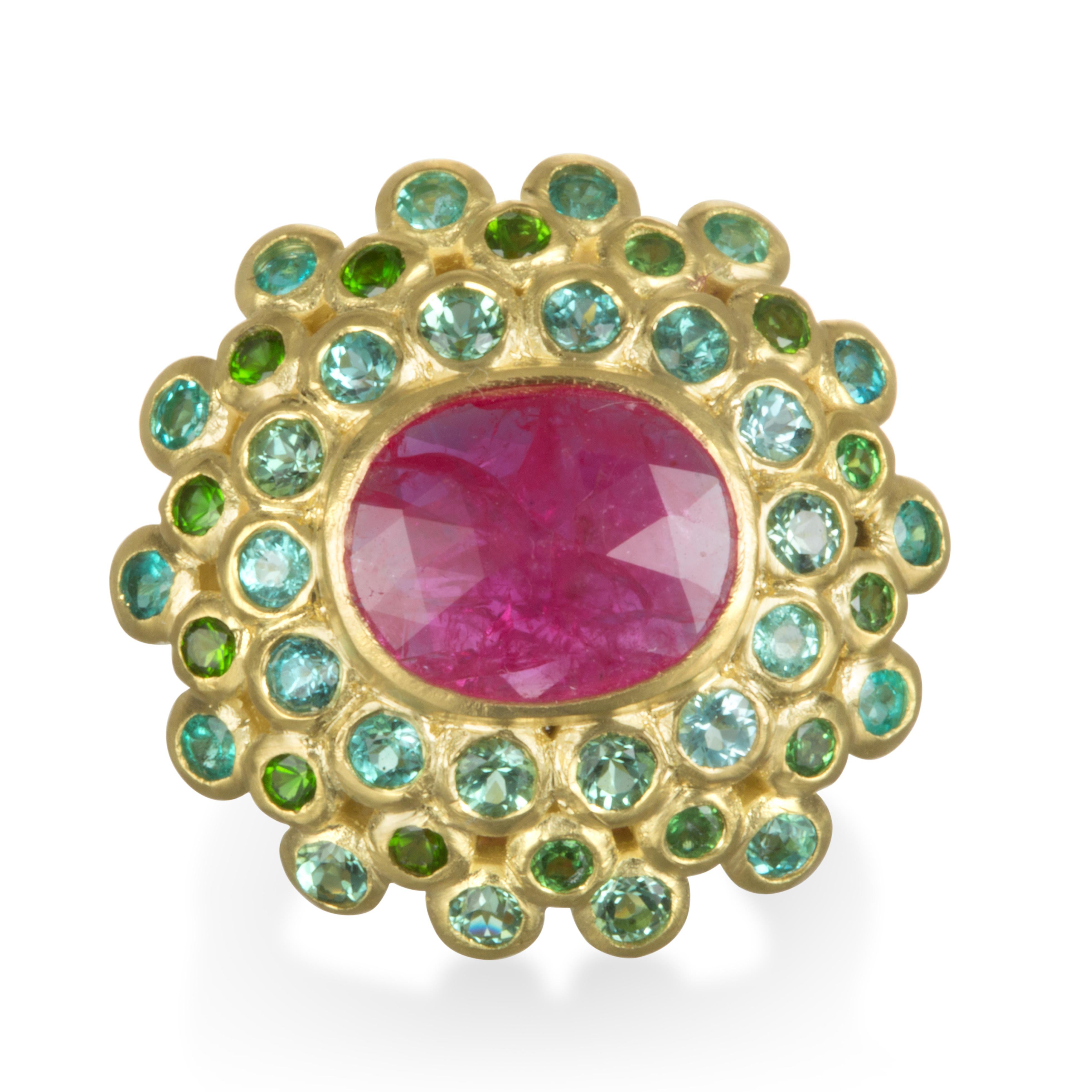 Faye Kim 18k Gold Madagascar Ruby Paraiba Tourmaline and Tsavorite Garnet Ring.

Bold, Beautiful, and Unique 
This is a one of a kind, over-sized ring - a showpiece with eye-popping colors!  The vibrant pink-red color of the Madagascar Ruby is
