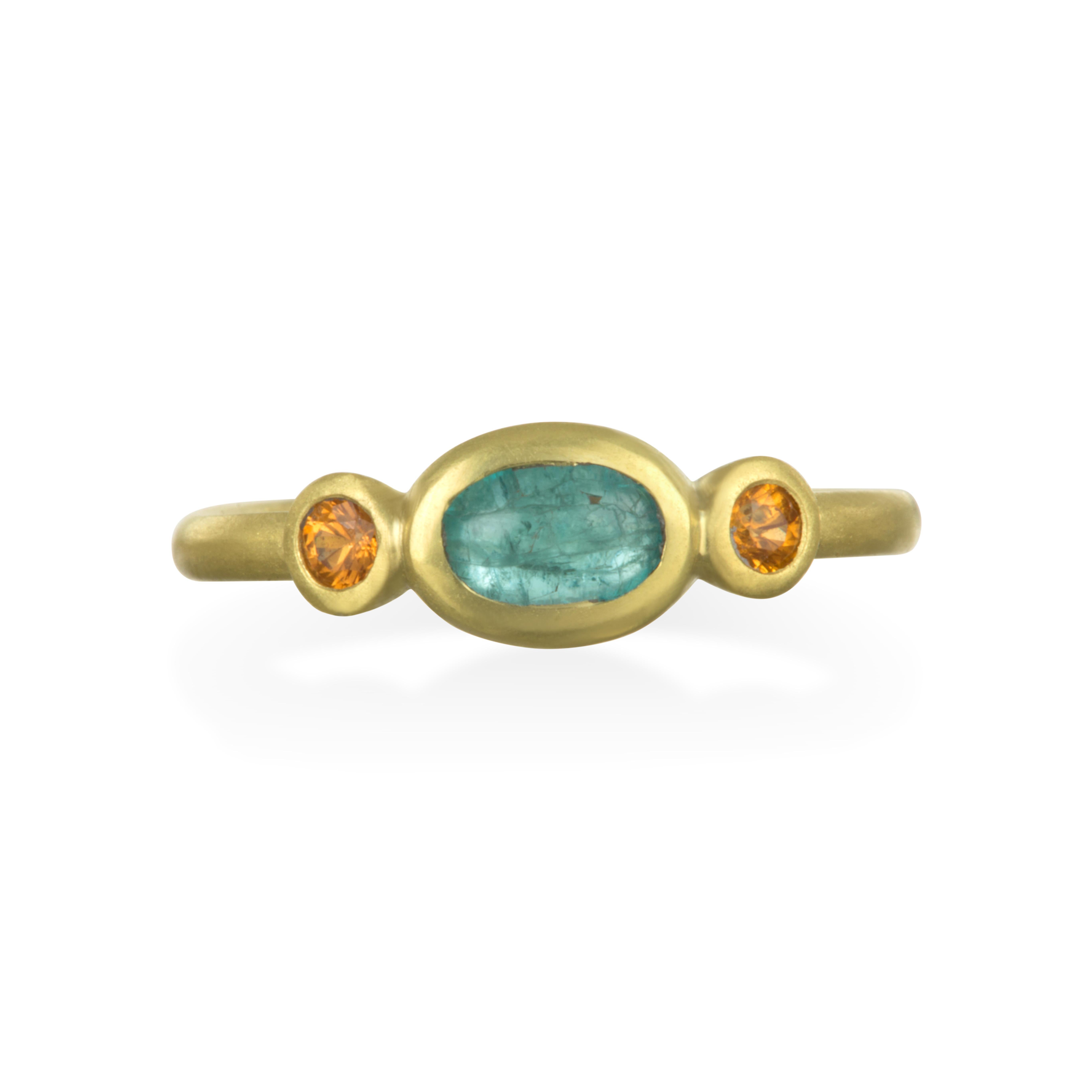 18k Gold Paraiba Tourmaline and Mandarin Garnet Stack Ring.  Coveted oval shaped Paraiba Tourmaline bezel set with matching bright Mandarin Garnets for one of the most interesting combinations of colors.  Stylish alone or paired with our other stack