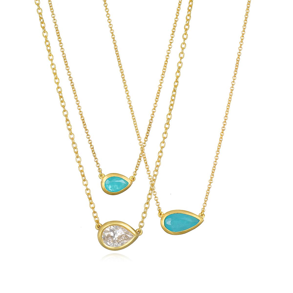 Faye Kim's 18K gold* Paraiba Tourmaline Pear Shape Bezel Necklace is beautiful worn alone or layered with other necklaces. Paraiba Tourmalines, with their vivid, almost electric color, originate in Brazil and are valued for their rarity.

*In Faye