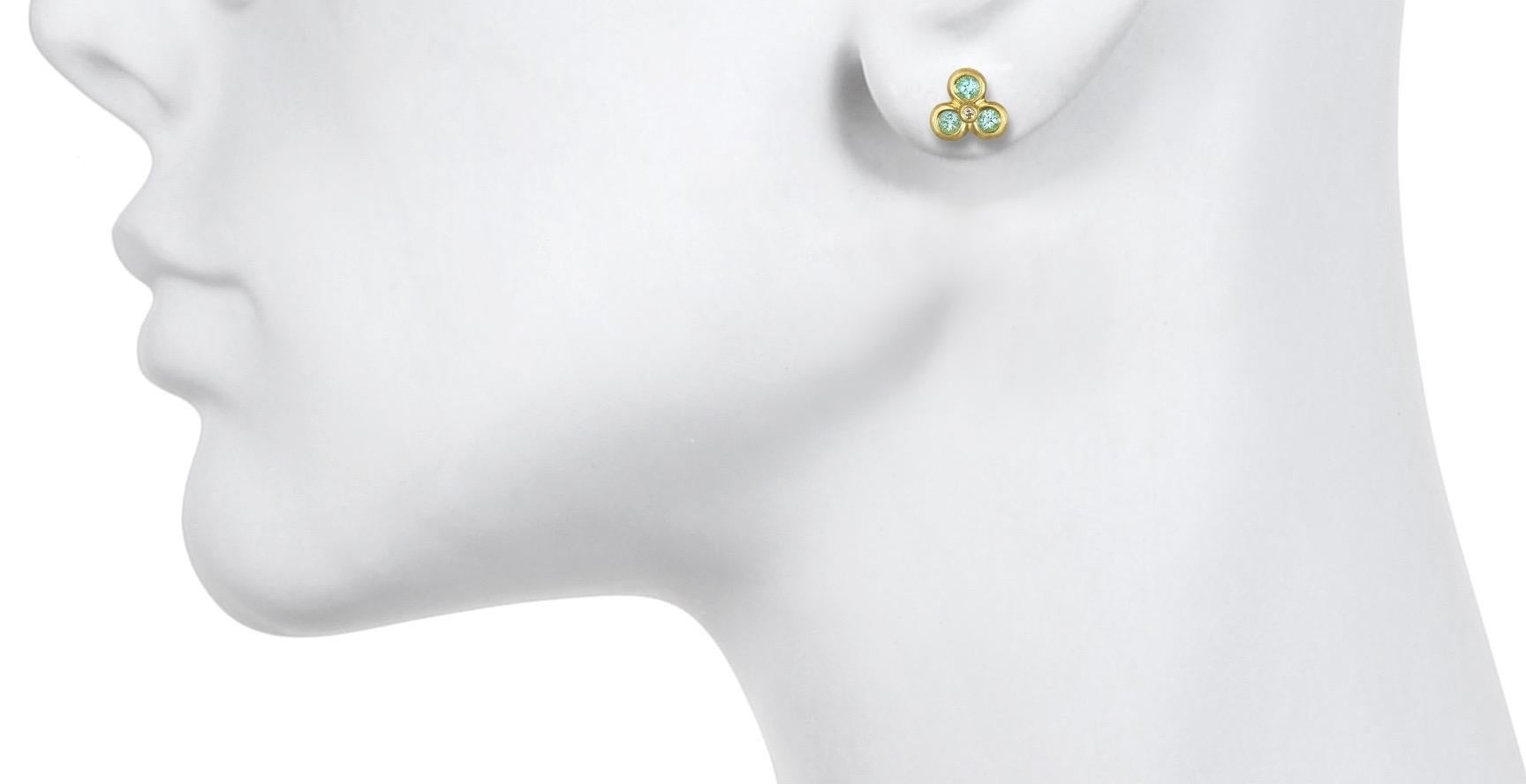 Faye Kim 18K Green Gold Stud Earrings set with brilliant Paraiba Tourmalines and White Diamonds.
Diameter .312